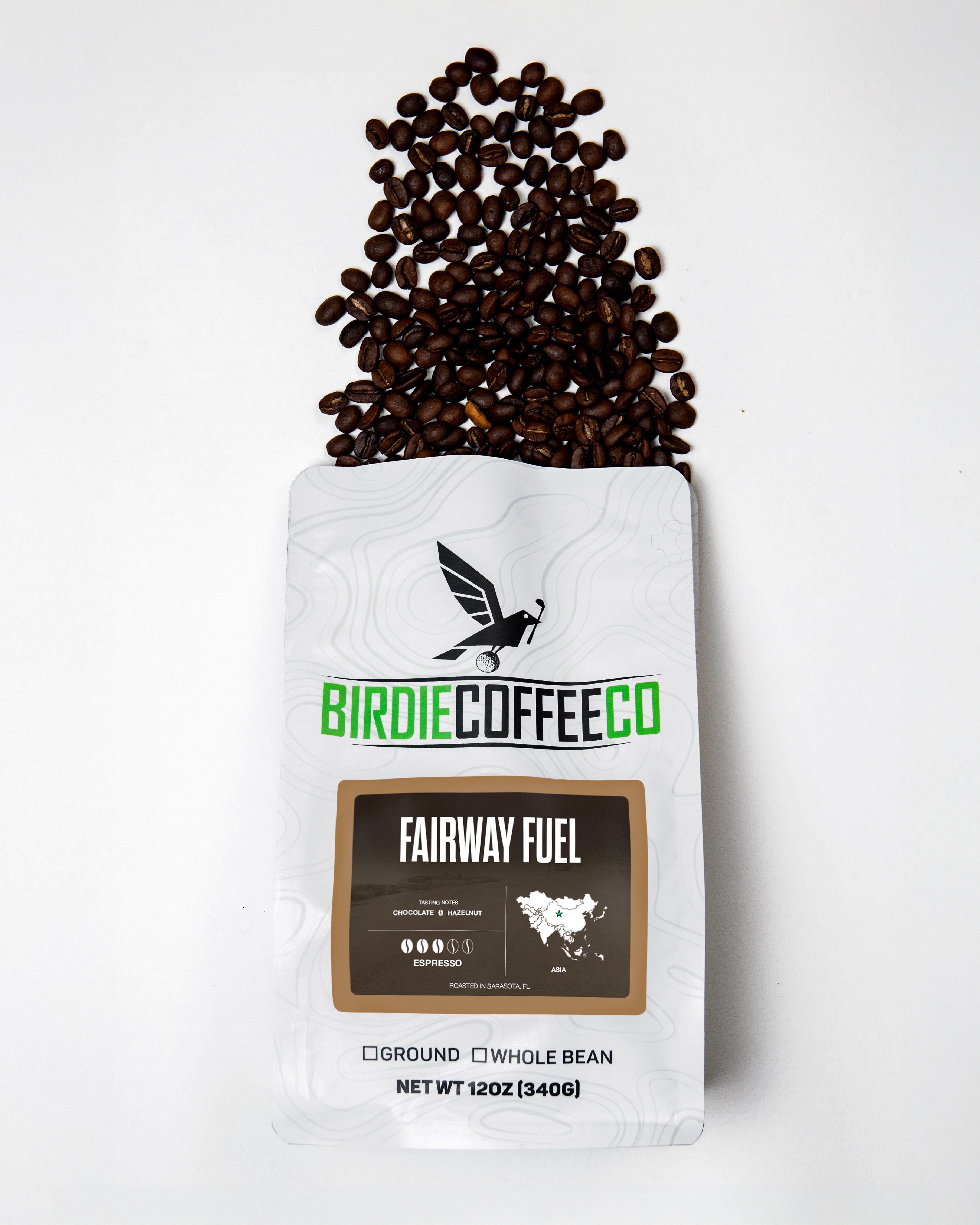 Medium roast coffee bag from Birdie Coffee Company labeled Fairway Fuel, featuring a green and brown packaging design.