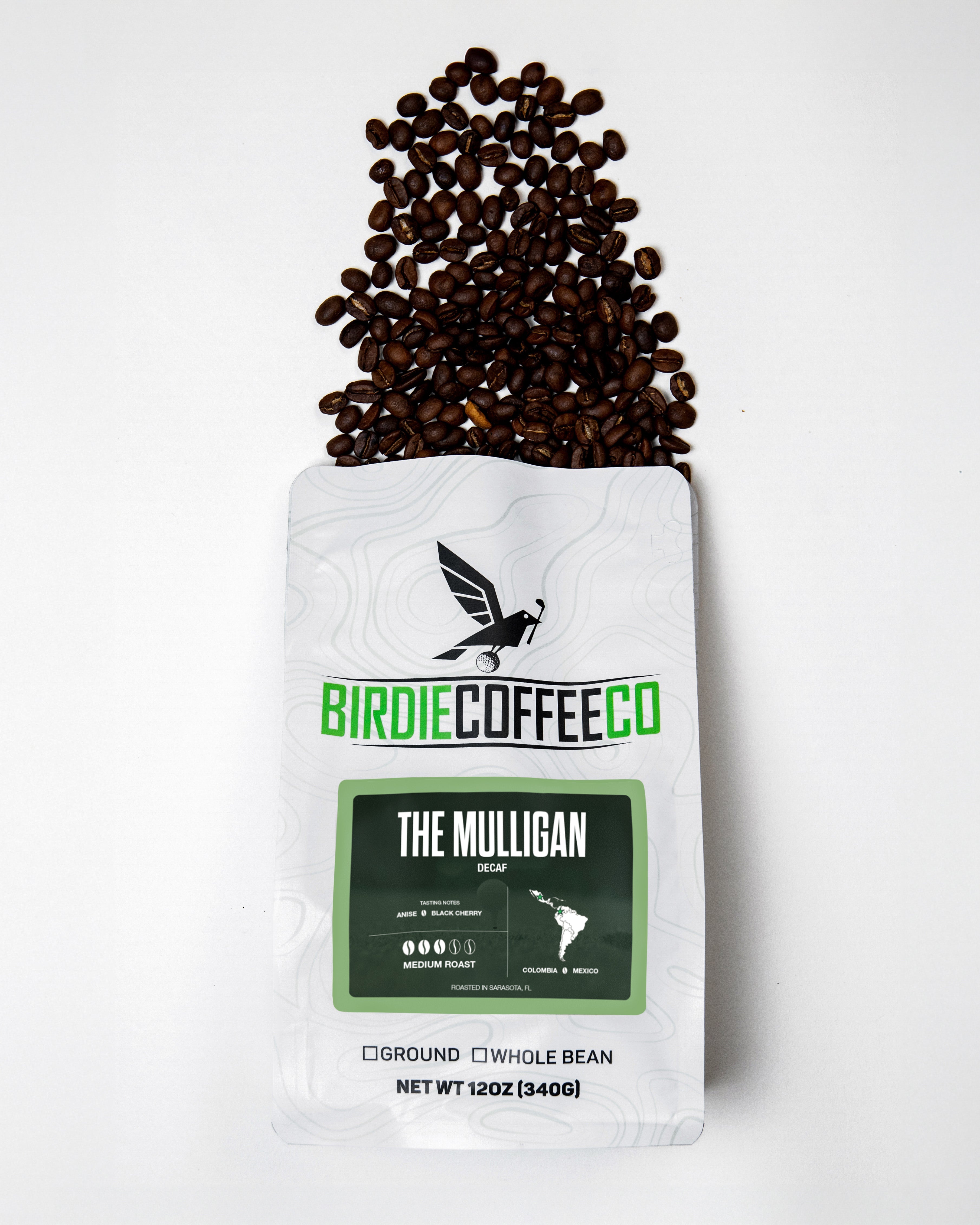 Decaf coffee bag labeled The Mulligan from Birdie Coffee Company, featuring a rustic coffee bag with branding and label details.