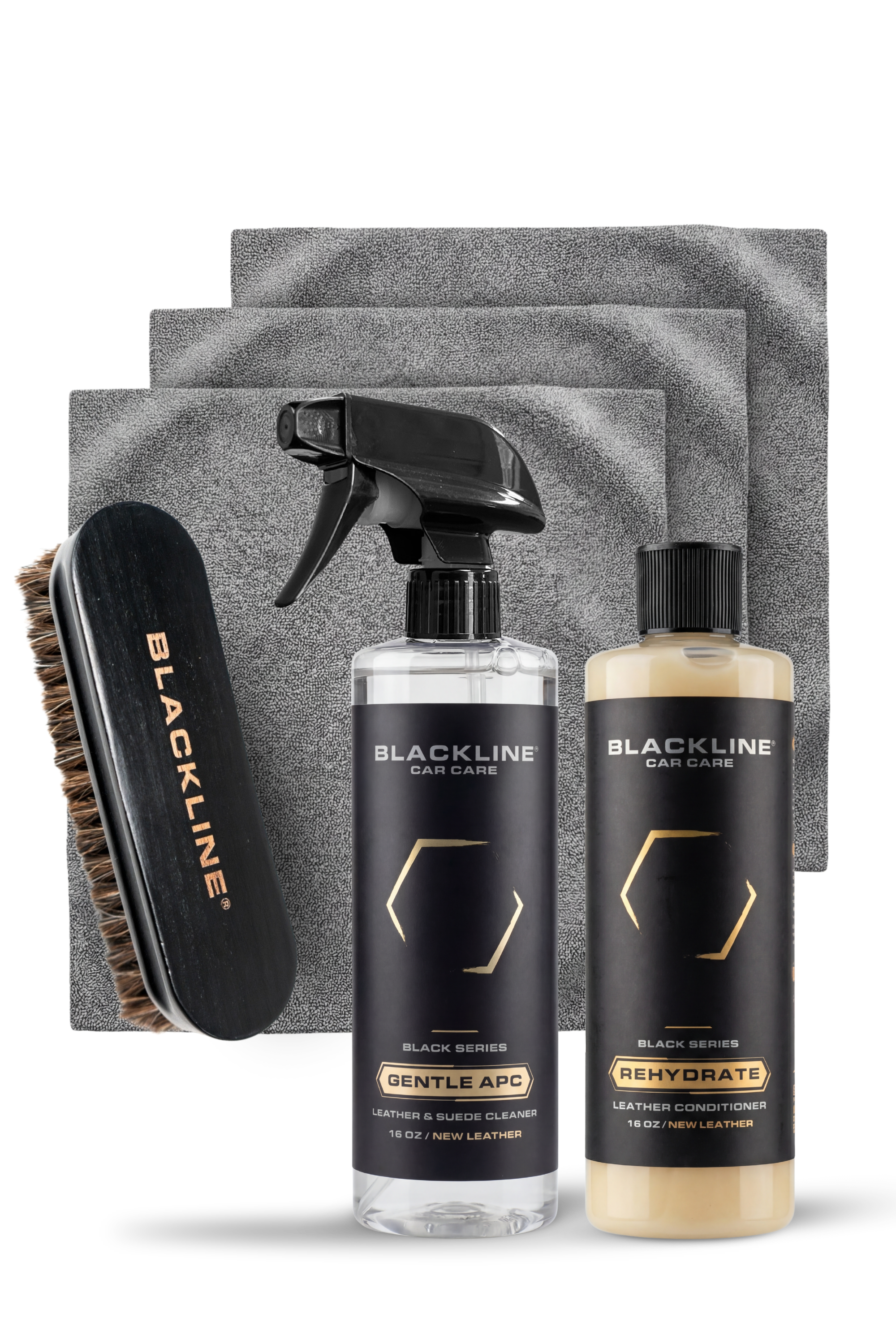 Blackline Car Care BLACKLINE® Rehydrate Leather Conditioner applied with a leather brush, restoring and conditioning vehicle leather surfaces.