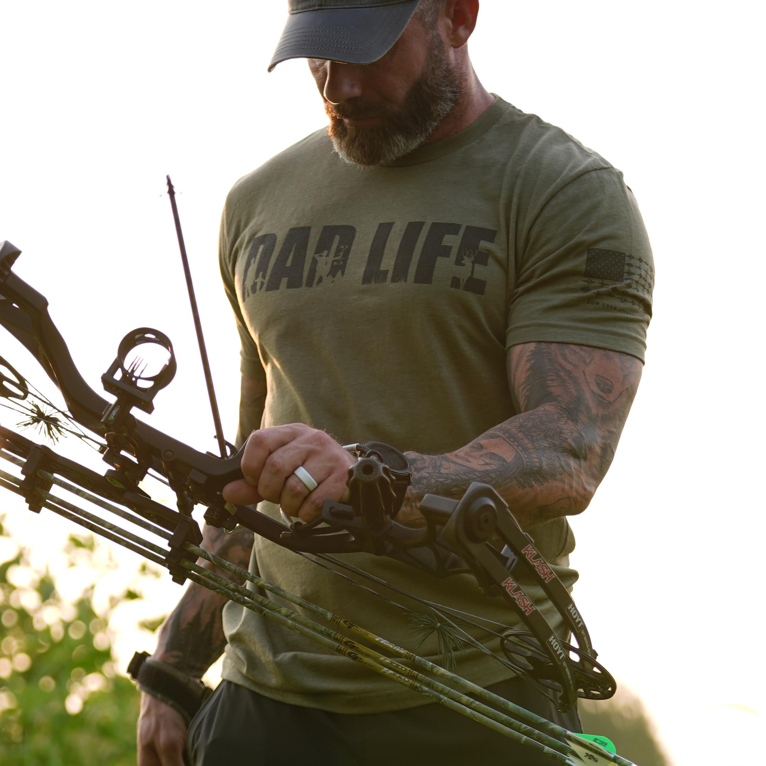 Black "DAD LIFE" T-shirt by Bow Crew Apparel featuring bold white text, casual fit, perfect for outdoor or casual wear.