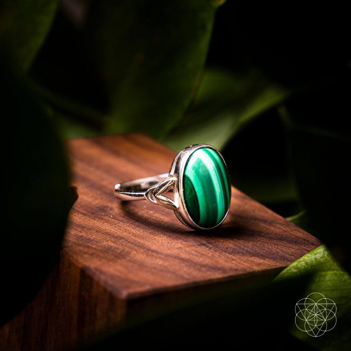 Silver heart-shaped ring from Conscious Items, designed for healing and emotional well-being, featuring intricate detailing.