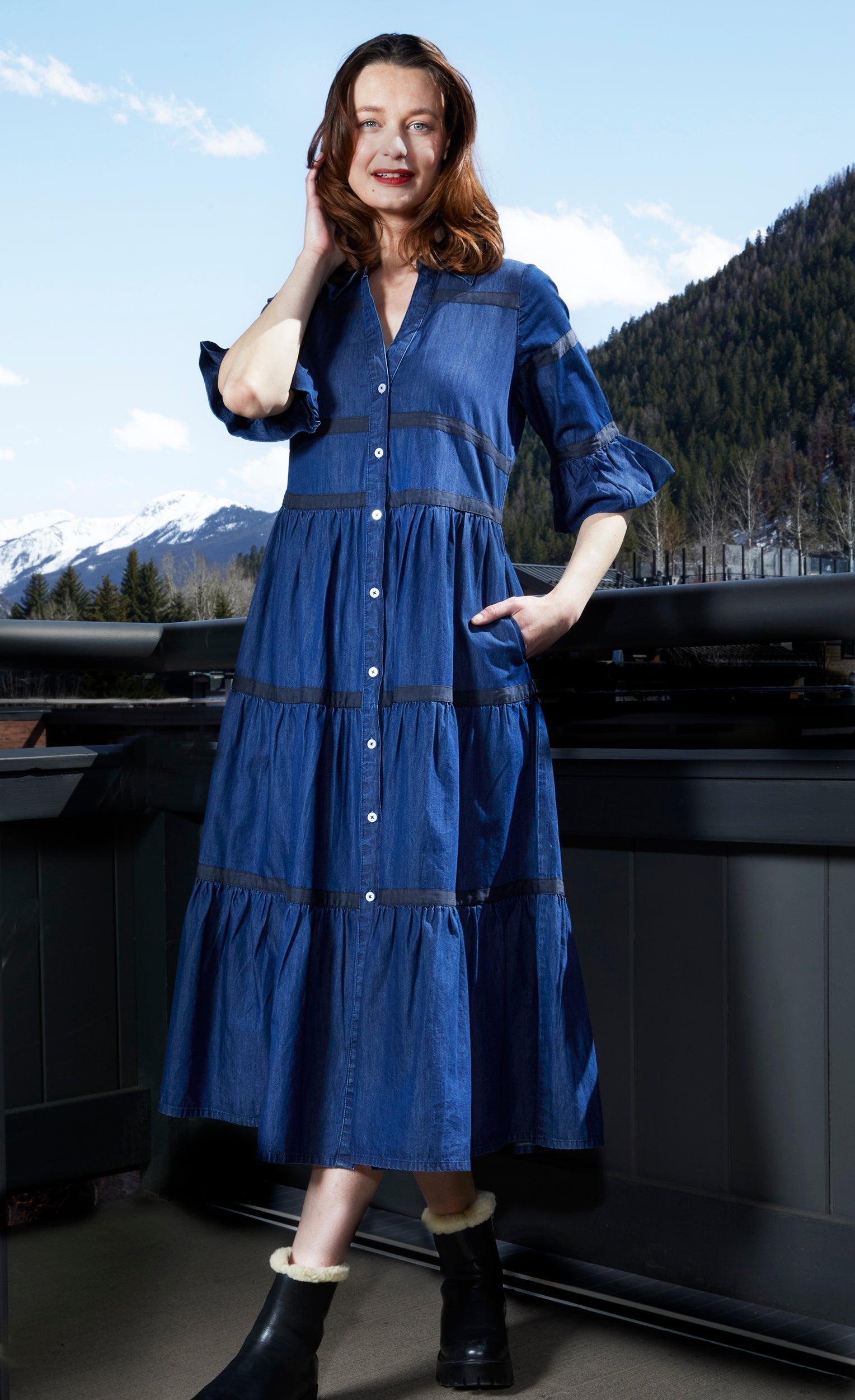 Dizzy-Lizzie Miami denim dress with black ribbon trim, sleeveless design and casual fit, shown on a model.