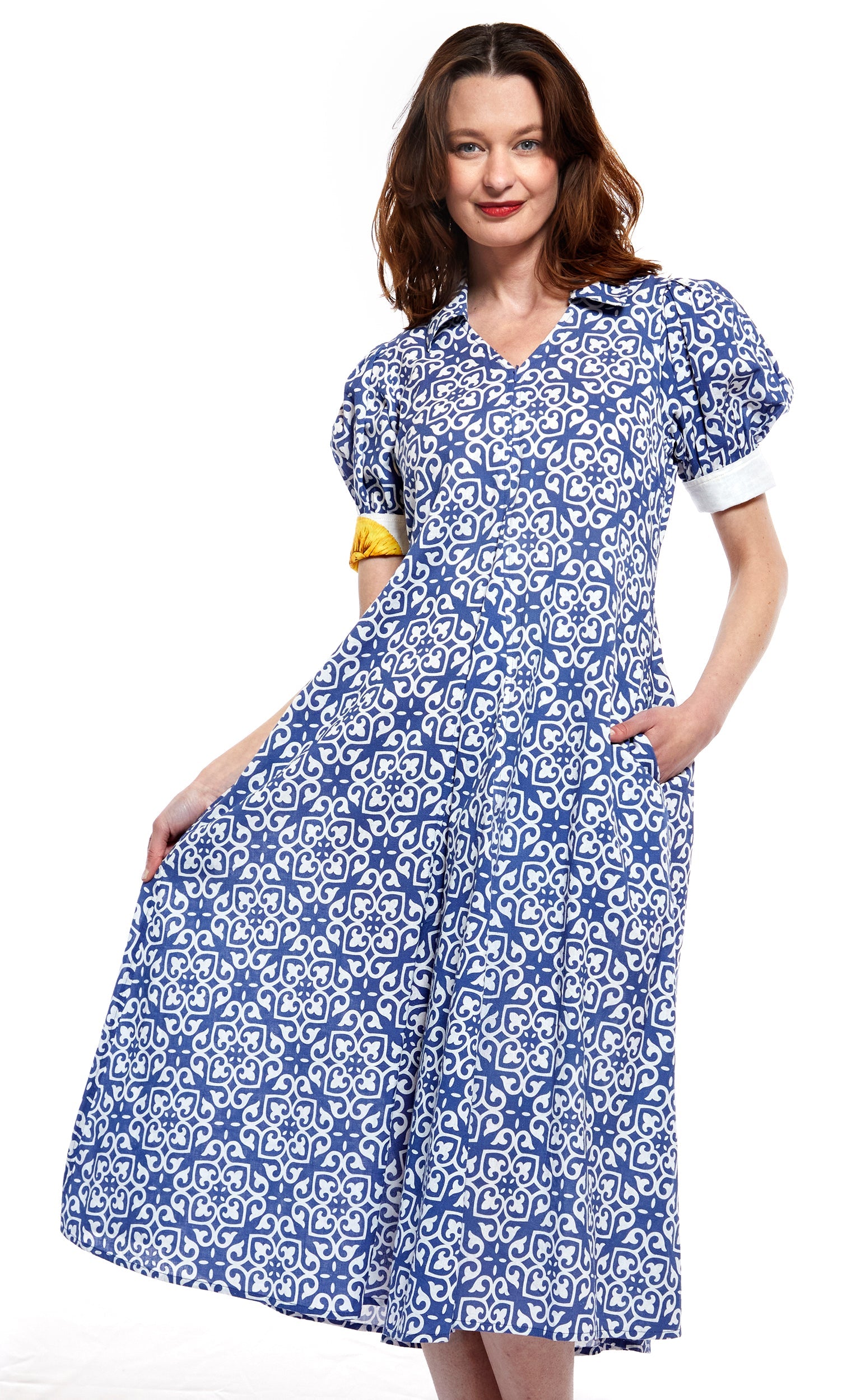 Blue Montauk Dress by Dizzy-Lizzie with a white geometric pattern, featuring a sleeveless design and flowing fabric.