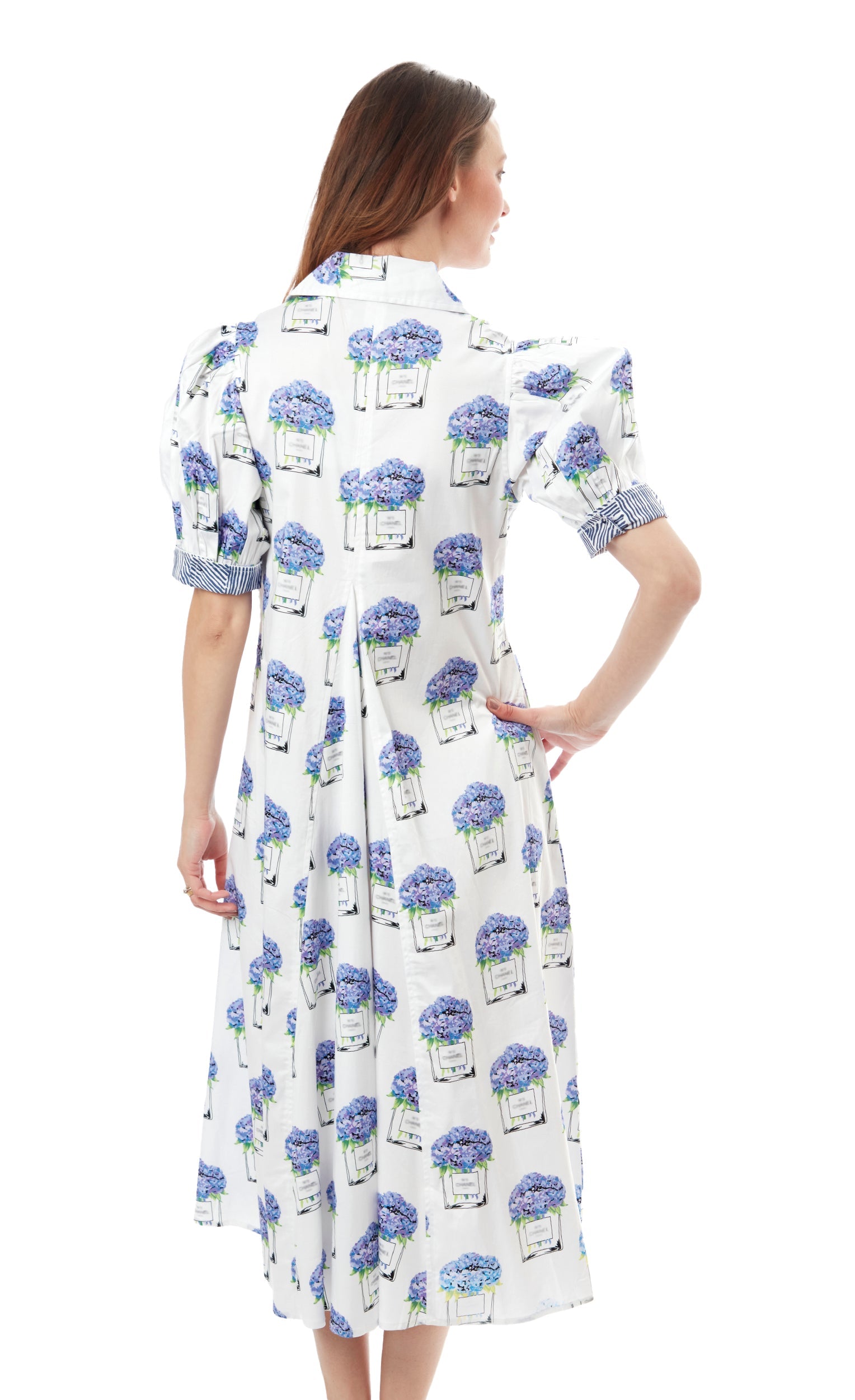 Dizzy-Lizzie Montauk Dress Perfume bottle with hydrangea flowers, elegant dress-inspired design, floral and sophisticated aesthetic.