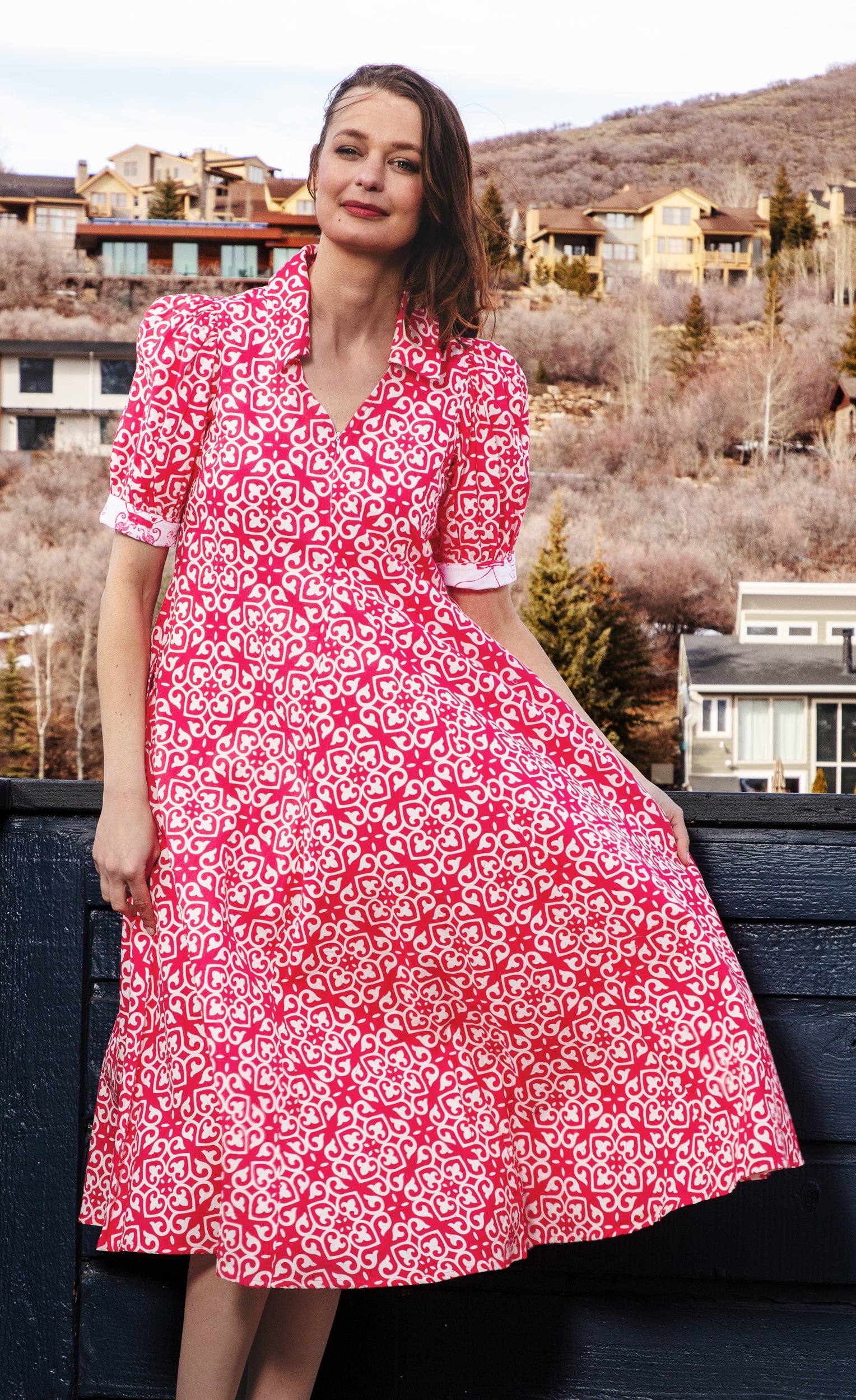 Pink and white geometric print Montauk dress by Dizzy-Lizzie, showcasing a stylish, flowing dress with a vibrant pattern.