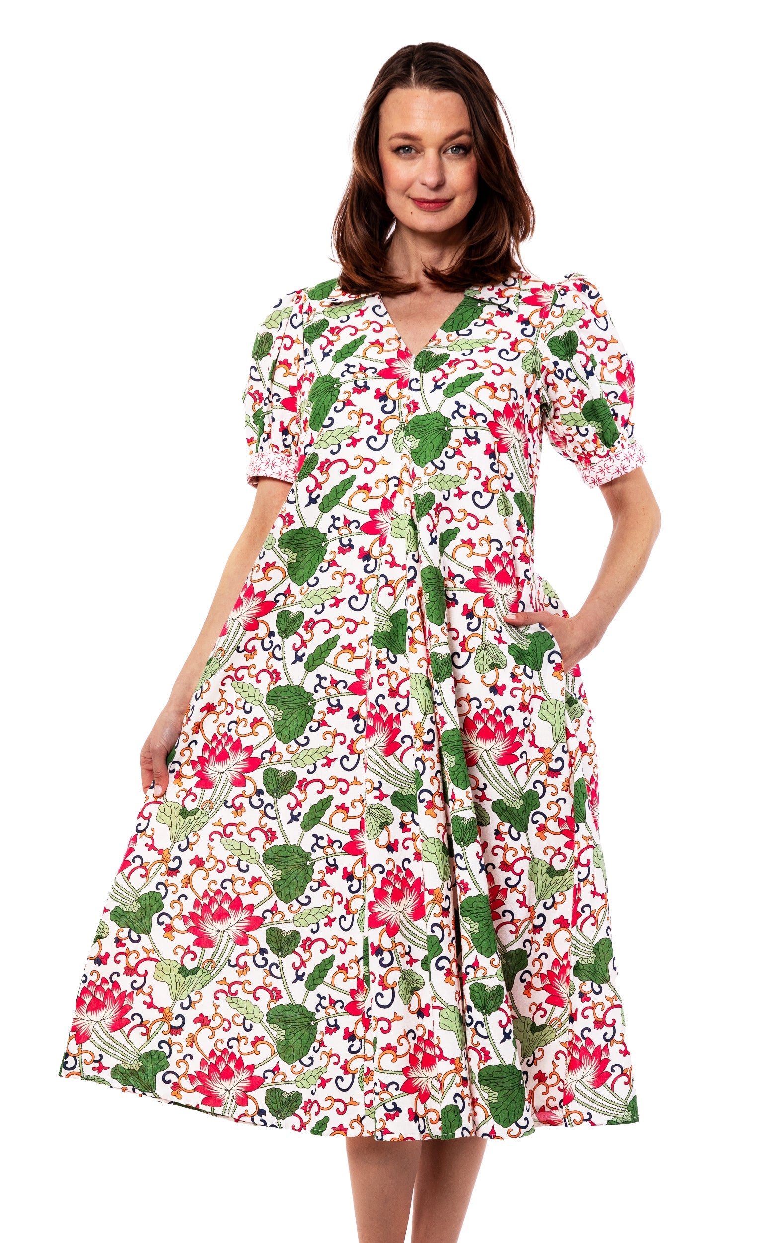 Dizzy-Lizzie Montauk Dress in white with floral pattern, sleeveless summer dress with flowy fabric and ruffled hem.