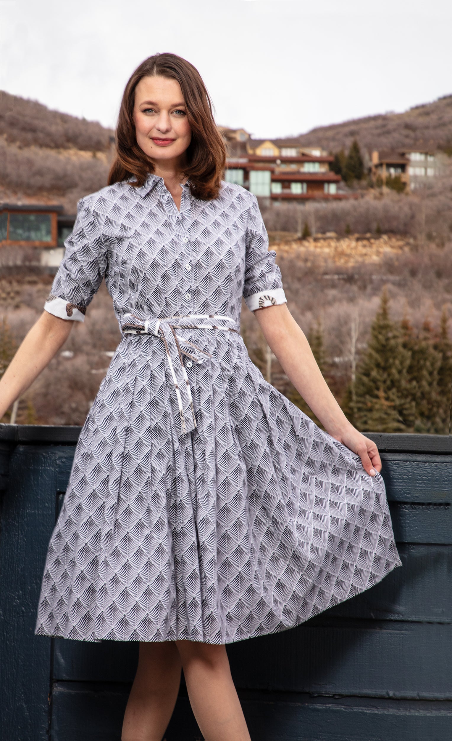 Dizzy-Lizzie Mrs Maisel black and white geometric dress with fitted silhouette and stylish pattern.