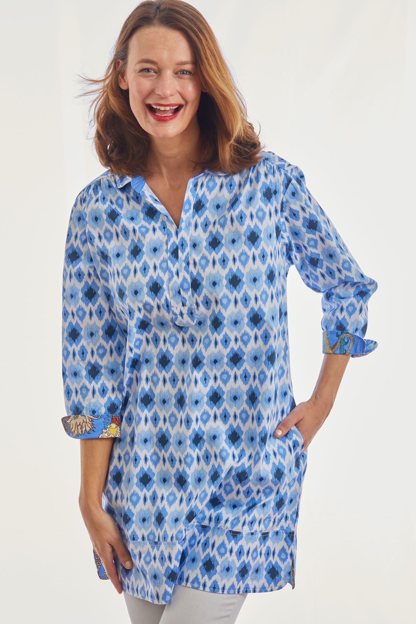 Blue Vail Tunic shirt with Ikat print by Dizzy-Lizzie, featuring a relaxed fit and vibrant pattern, shown front view.