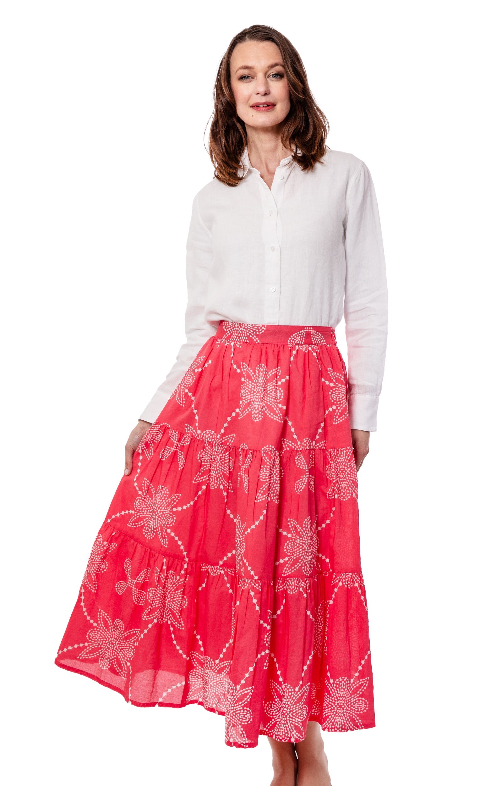 Dizzy-Lizzie Woodstock pink and white print skirt with floral pattern and flowy fabric, styled for casual wear.