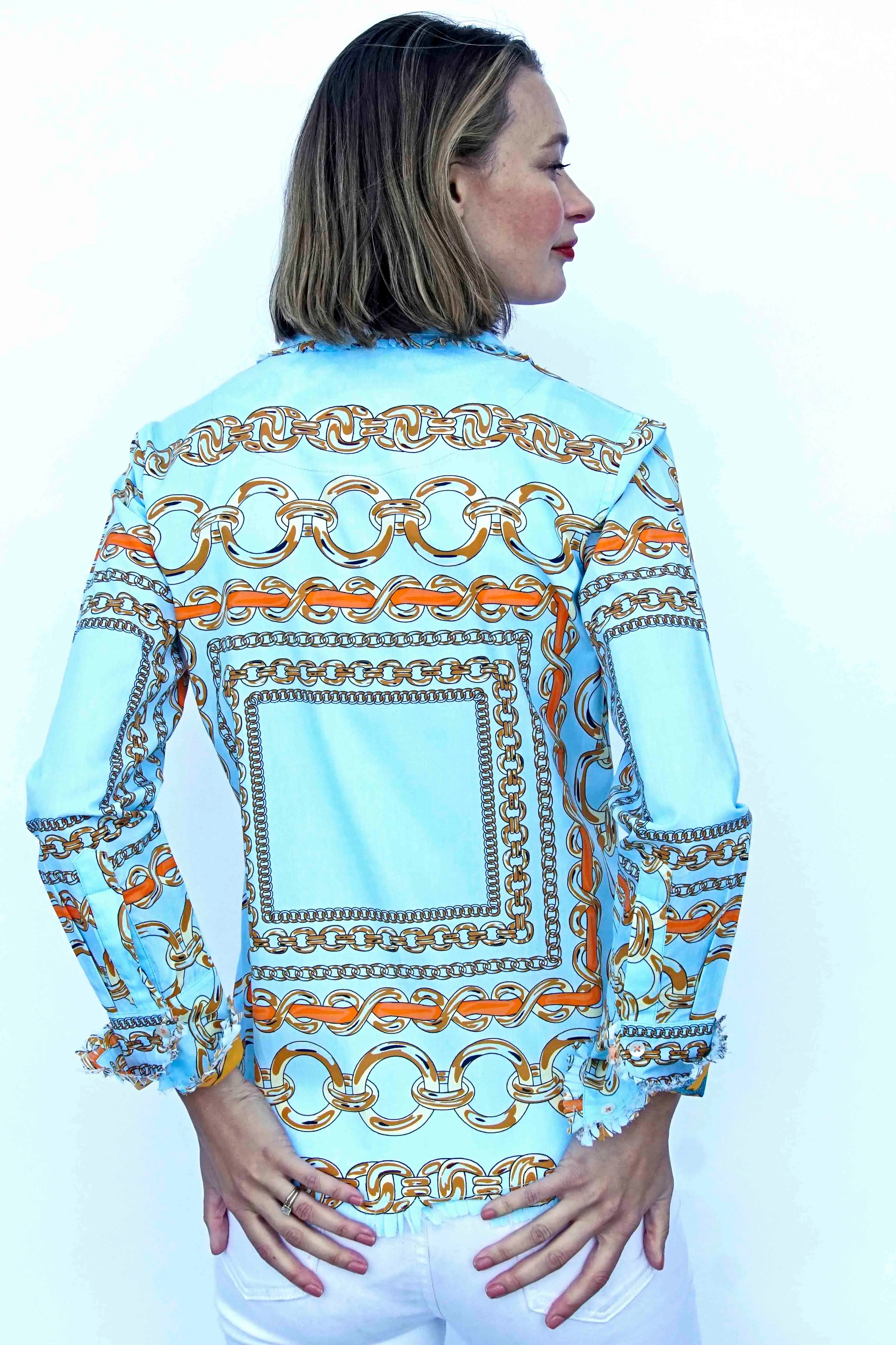 Dizzy-Lizzie Cape Cod Aqua Ground Tunic with orange link pattern, lightweight fabric, casual fit, and vibrant design.