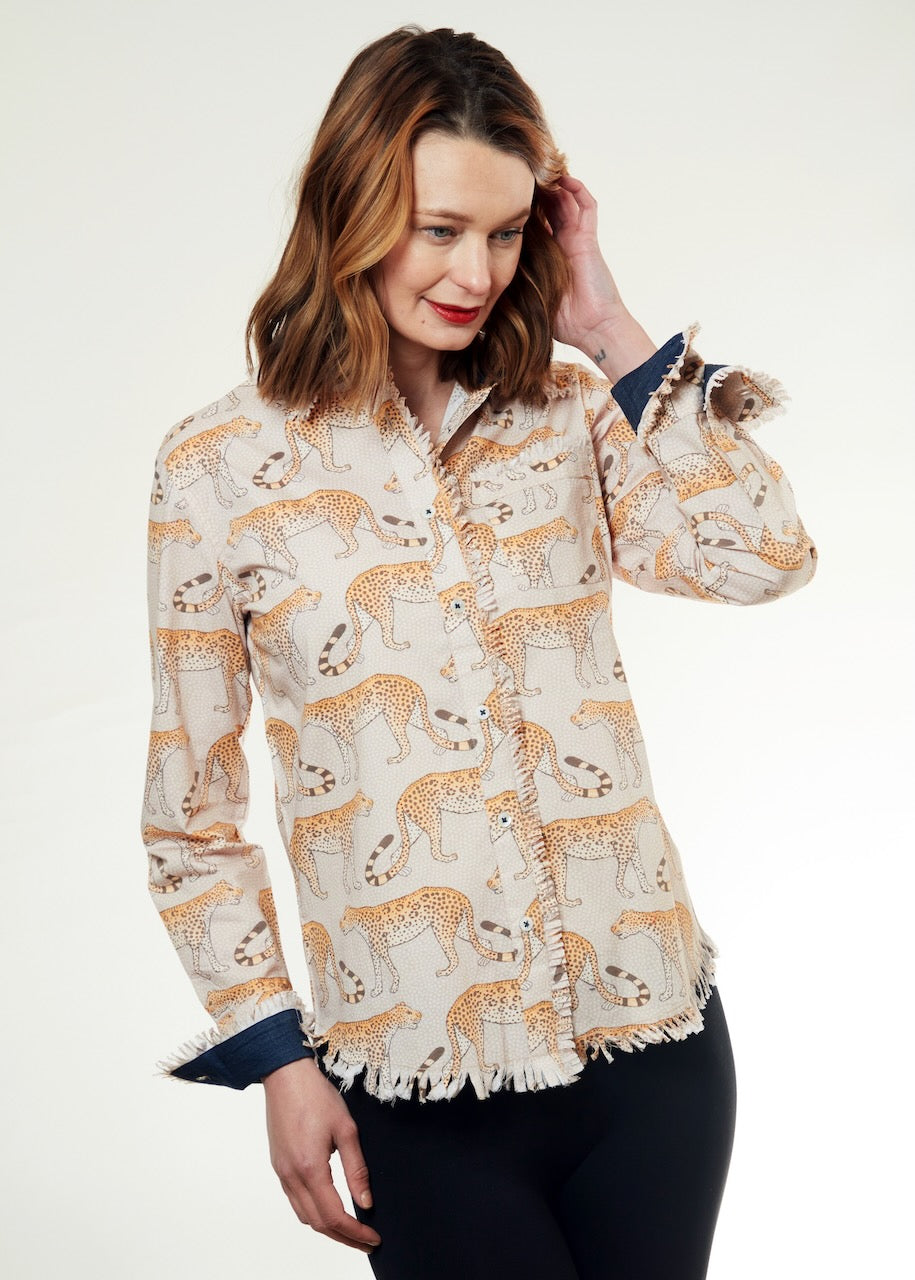 Dizzy-Lizzie Cape Cod Tunic with leopard print, lightweight fabric, and relaxed fit, displayed on a hanger.