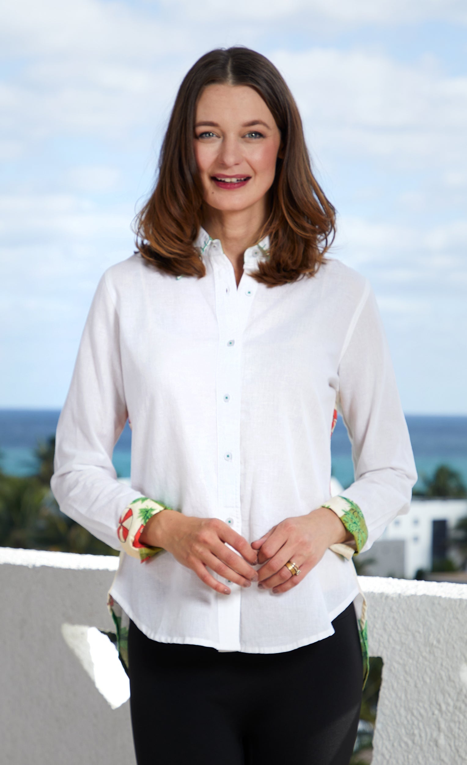 Dizzy-Lizzie Chesapeake Hi-Lo Tunic in Swimmers Print, lightweight sleeveless tunic with a relaxed fit and vibrant aquatic pattern.