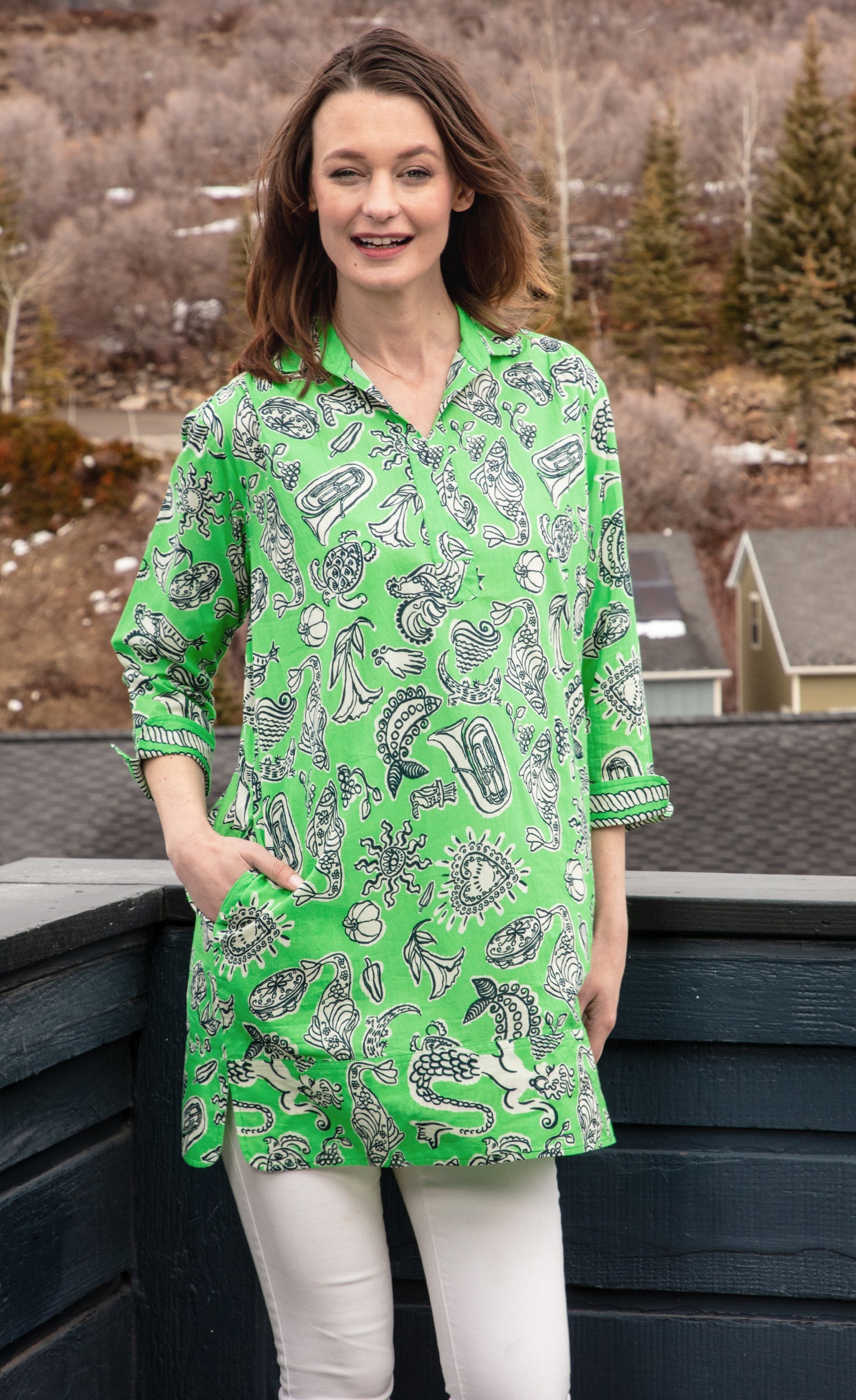 Green Vail Tunic by Dizzy-Lizzie with whimsical print, featuring a relaxed fit and stylish design perfect for casual wear.
