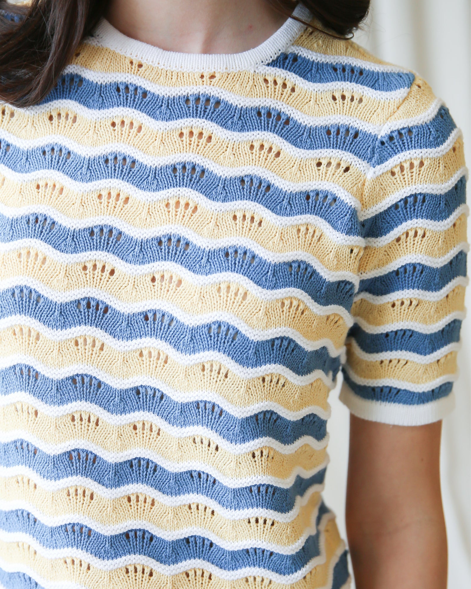 Downeast High Tides sweater, cozy knit sweater with tide-inspired pattern in soft colors, suitable for casual wear.