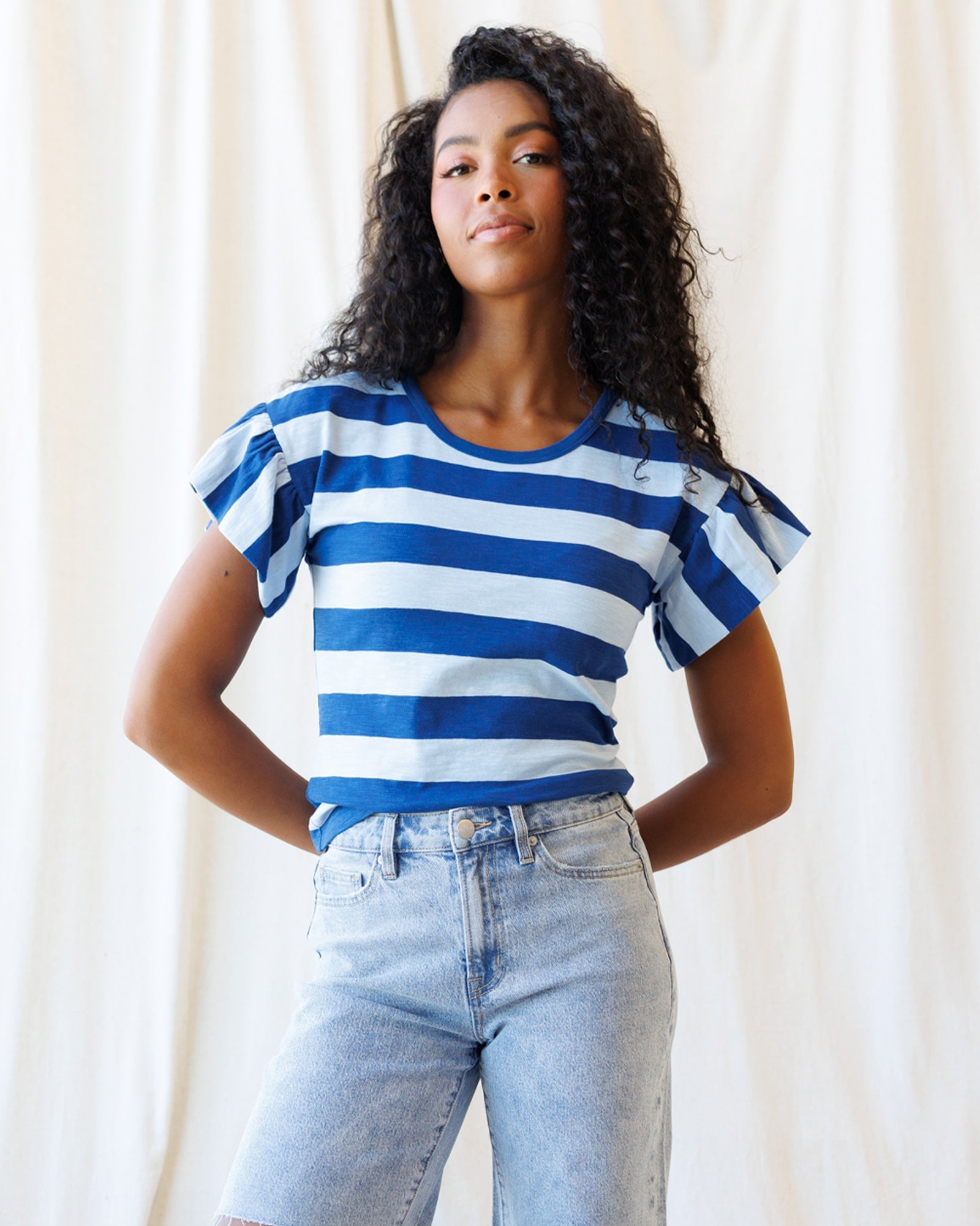 Downeast Charisma Tee, a stylish casual tops shirt in soft fabric with a relaxed fit, shown in a natural pose.