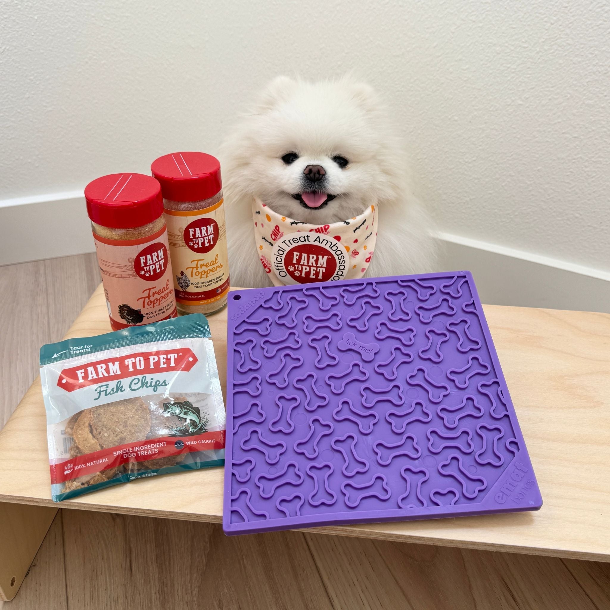 Large purple dog lick mat from Farm To Pet with a bone design, ideal for entertaining and calming dogs during feeding or treats.