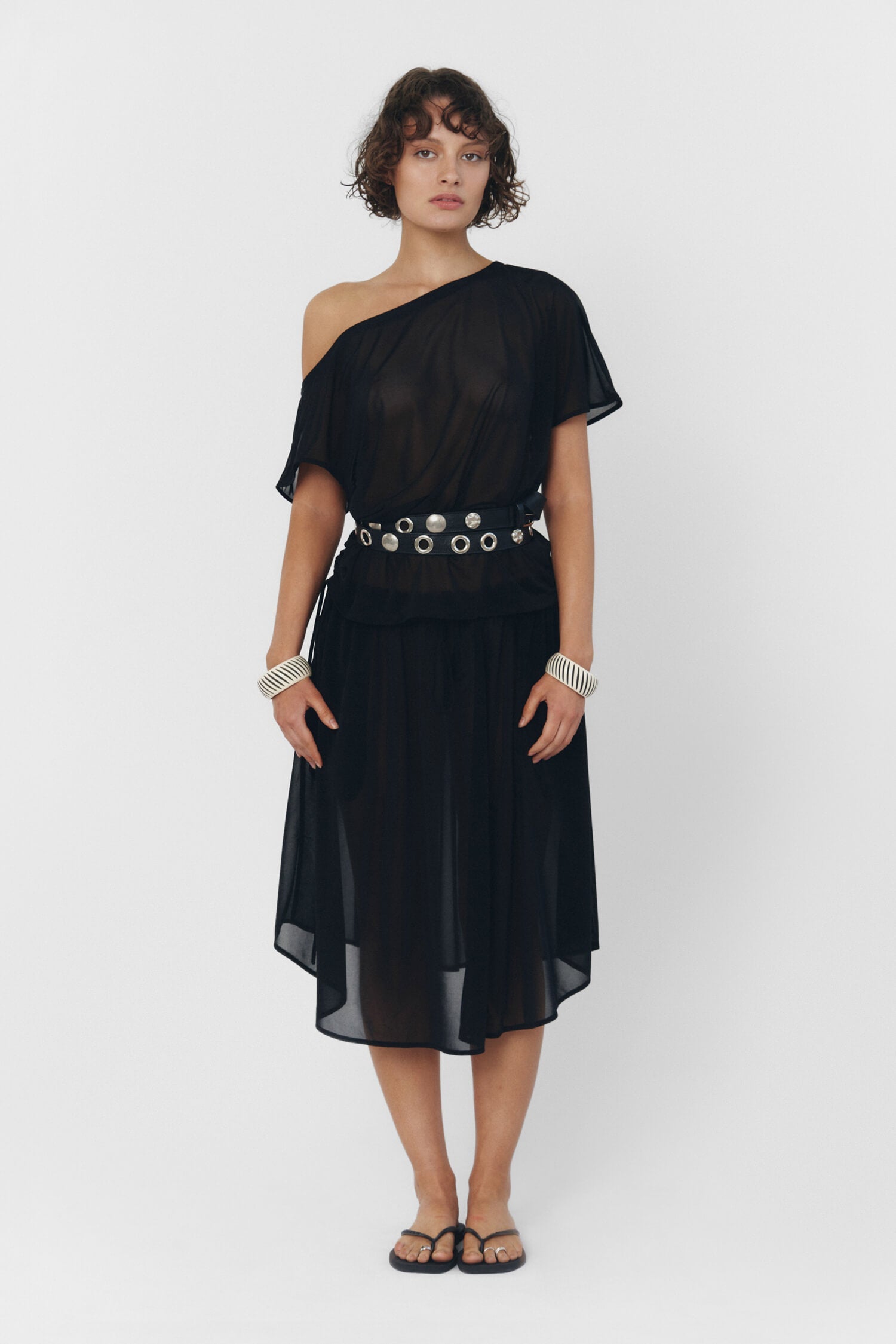 Black findmenowthelabel Brisa top shown on a model, featuring a stylish, fitted design with sleeveless cut and V-neck detail.