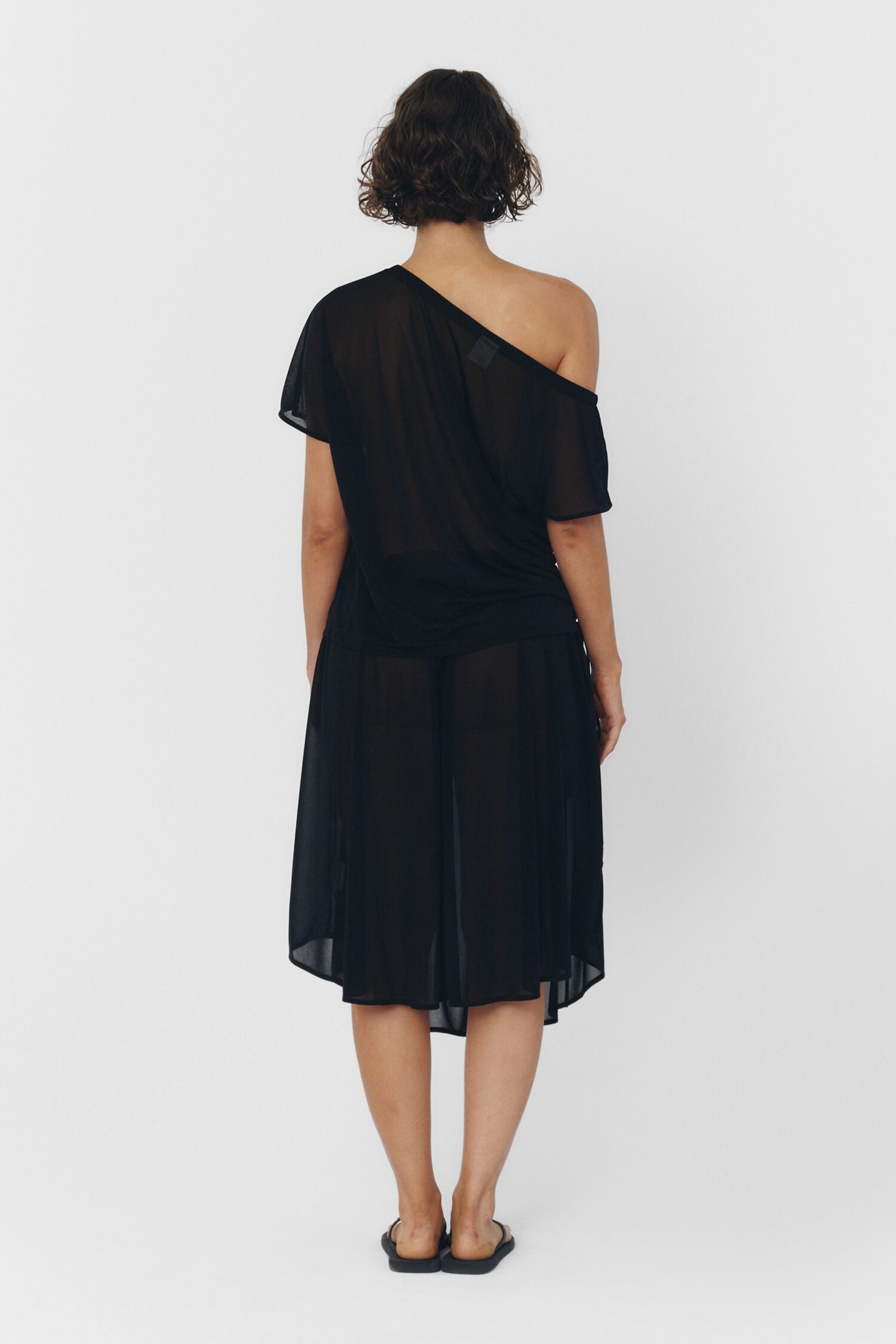 Black Brisa top by findmenowthelabel, featuring a stylish sleeveless design with smooth fabric and a modern fit.