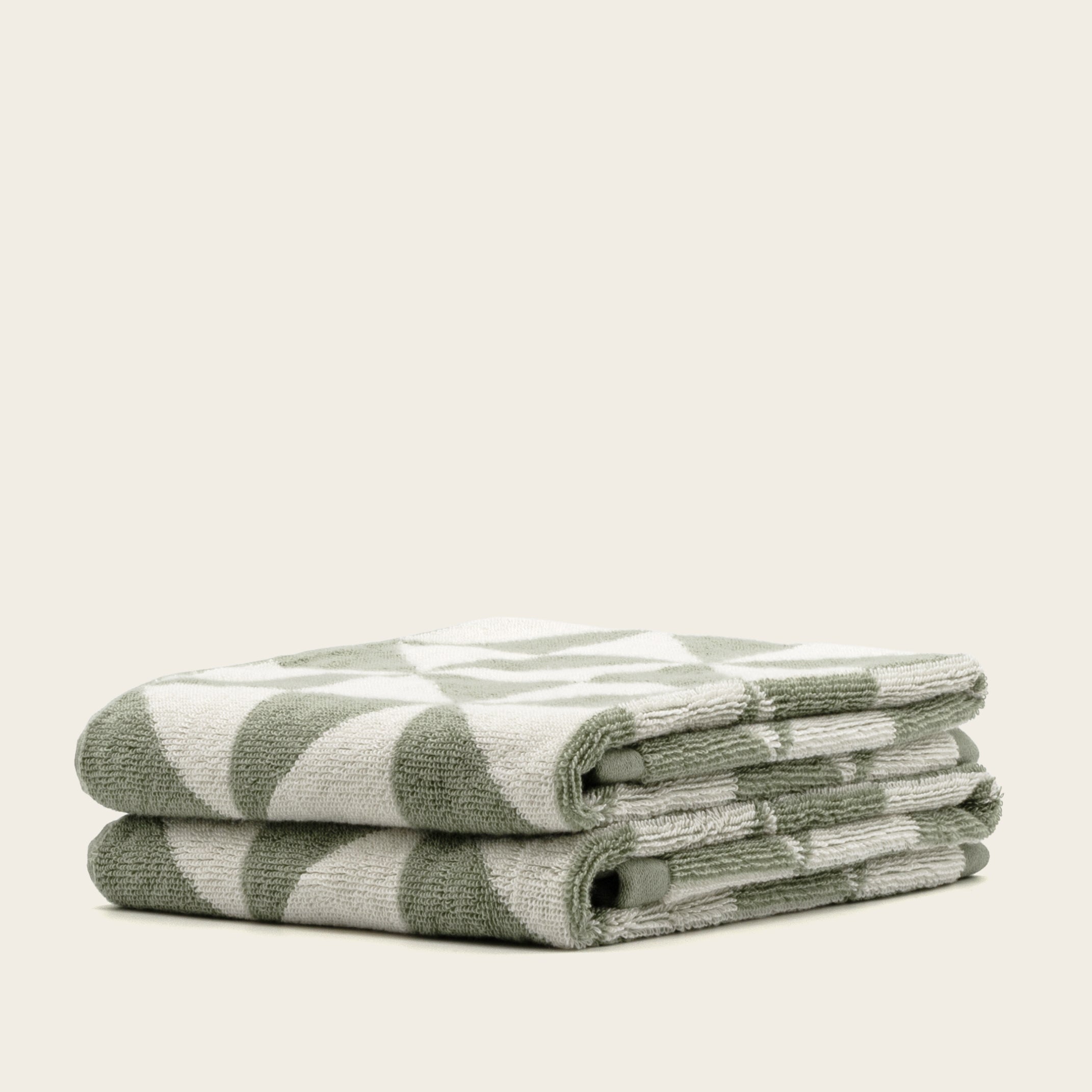 Set of two Umbra Australian Cotton Bath Towels in soft, plush fabric with a clean, modern design for home use.