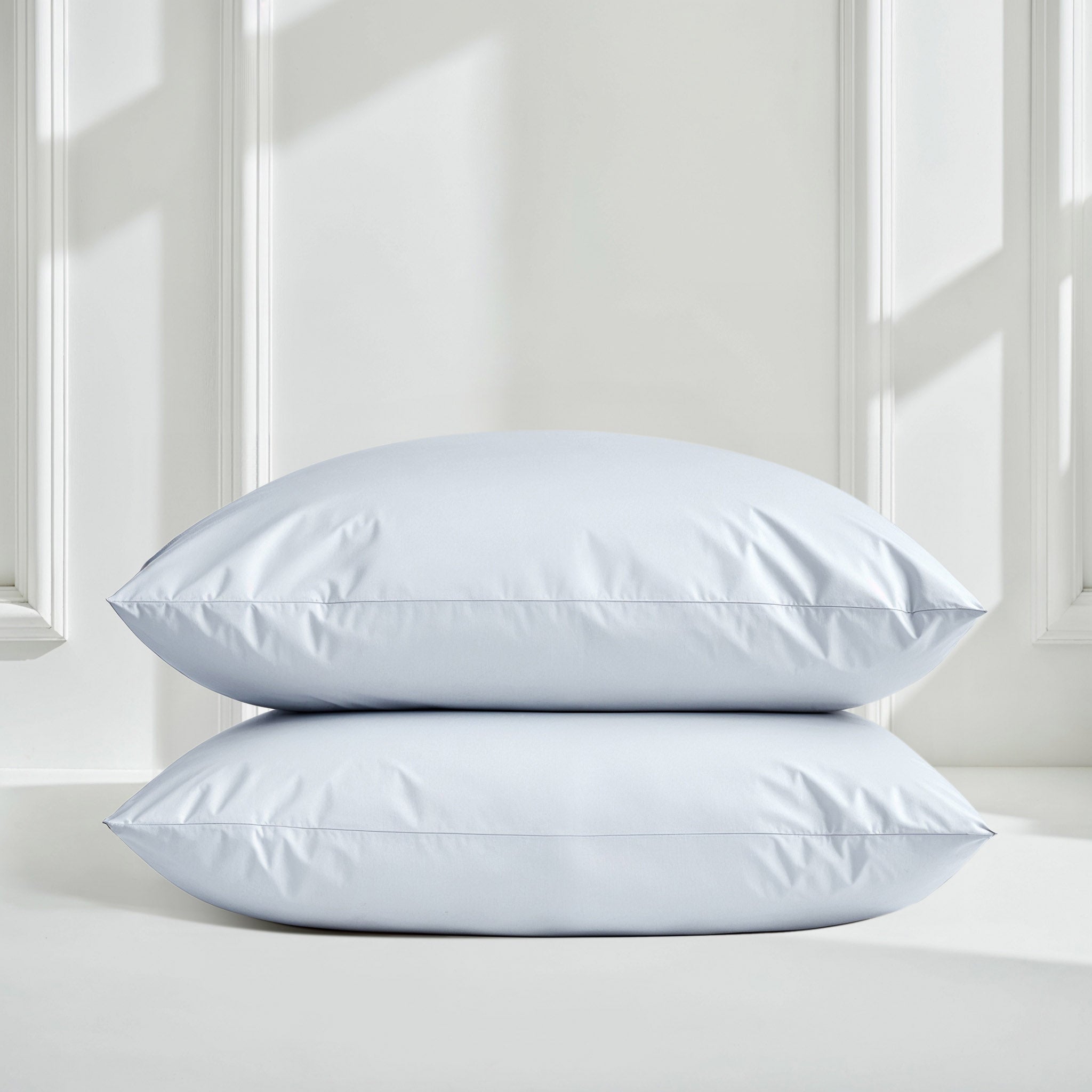 Soft white Luxe Australian Sateen Sheet Set from Italic, featuring smooth, luxurious bed sheets with a silky finish.