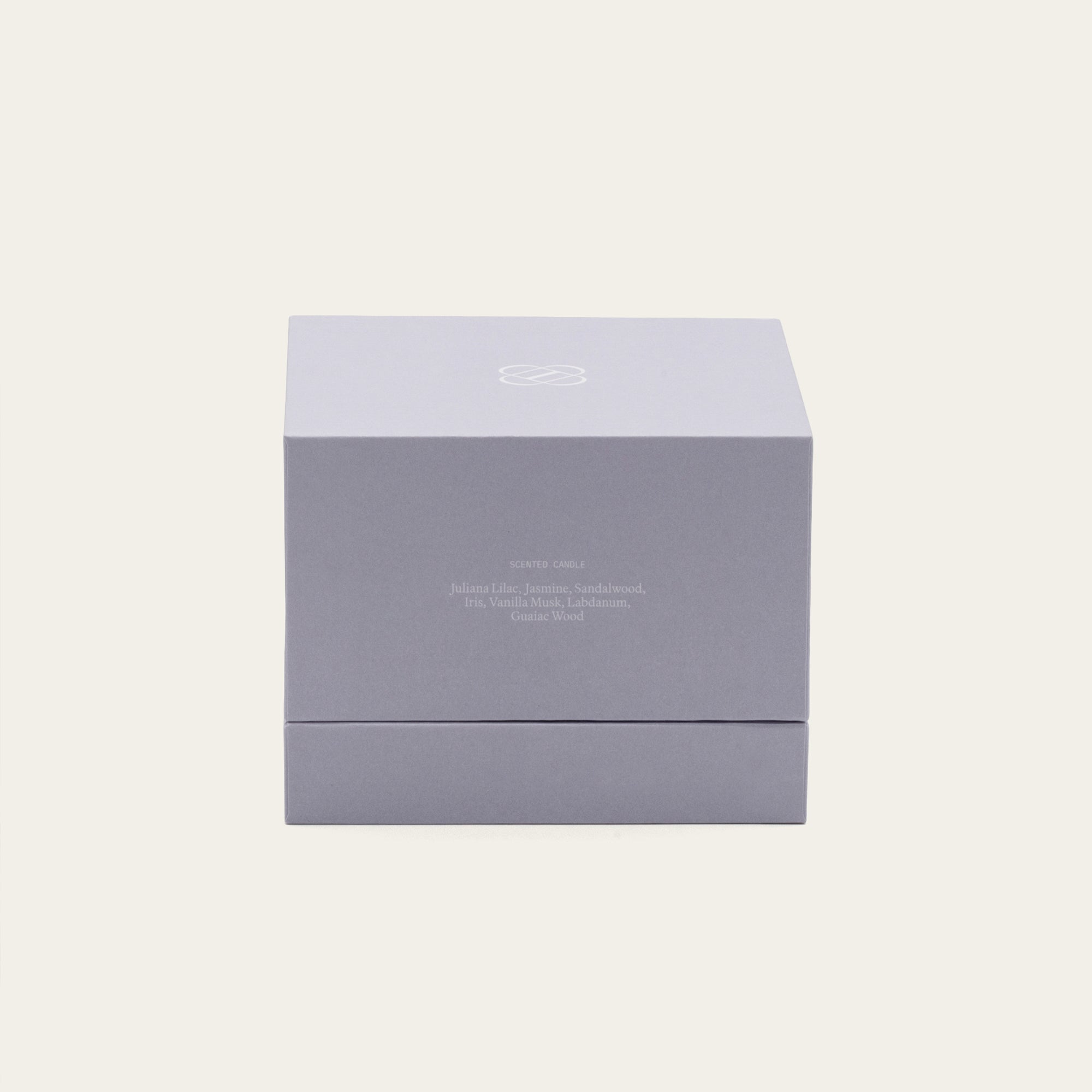 Lavender-colored ceramic candle holder with a soy wax candle from Italic, showcasing a smooth, glazed finish and elegant design.