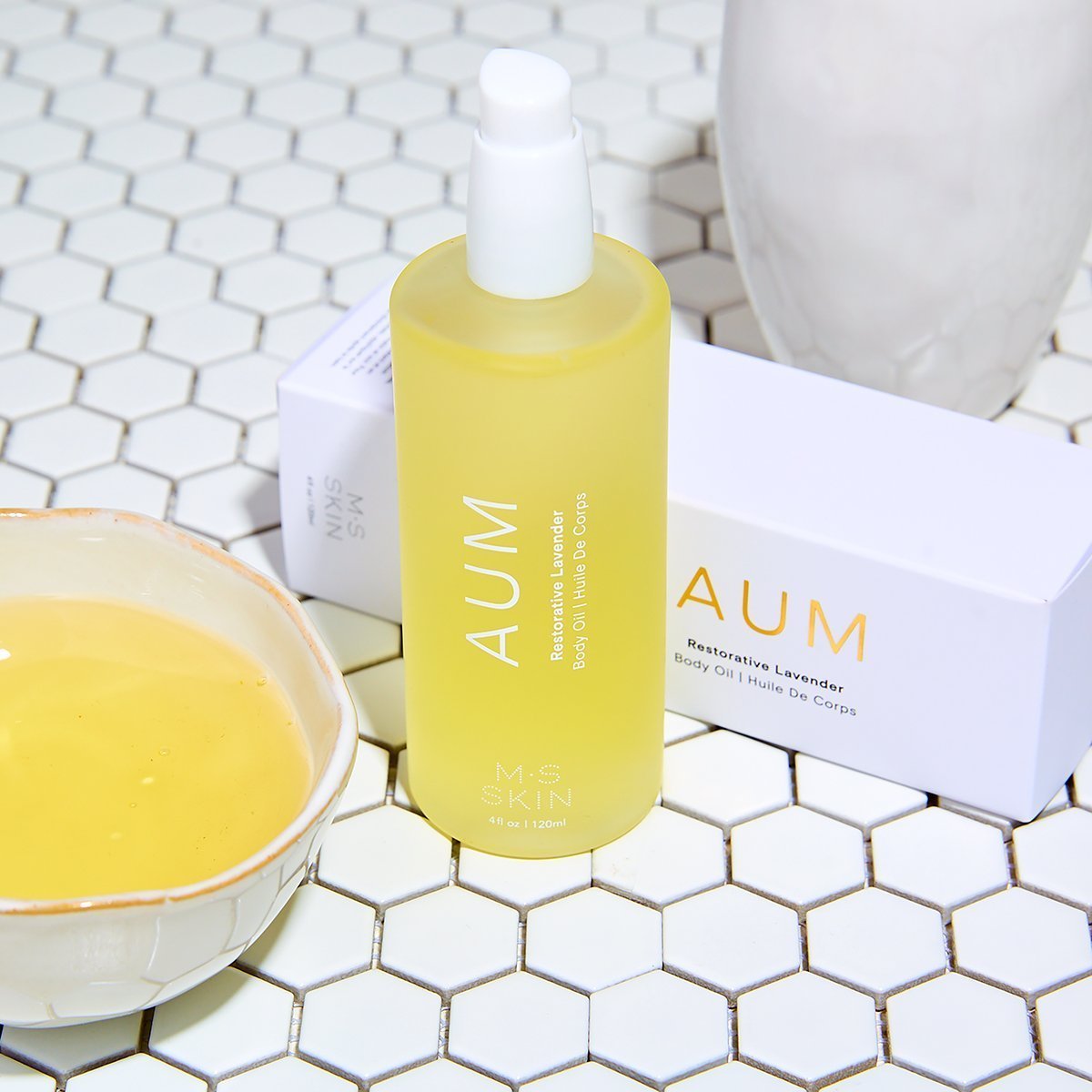 M.S Skincare AUM Ayurvedic oil bottle with natural herbal ingredients, featuring a dark glass container and minimalist label design.