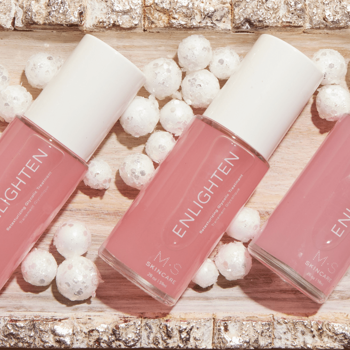 M.S Skincare ENLIGHTEN facial care product with sleek packaging, designed for skin brightening and overall skincare.