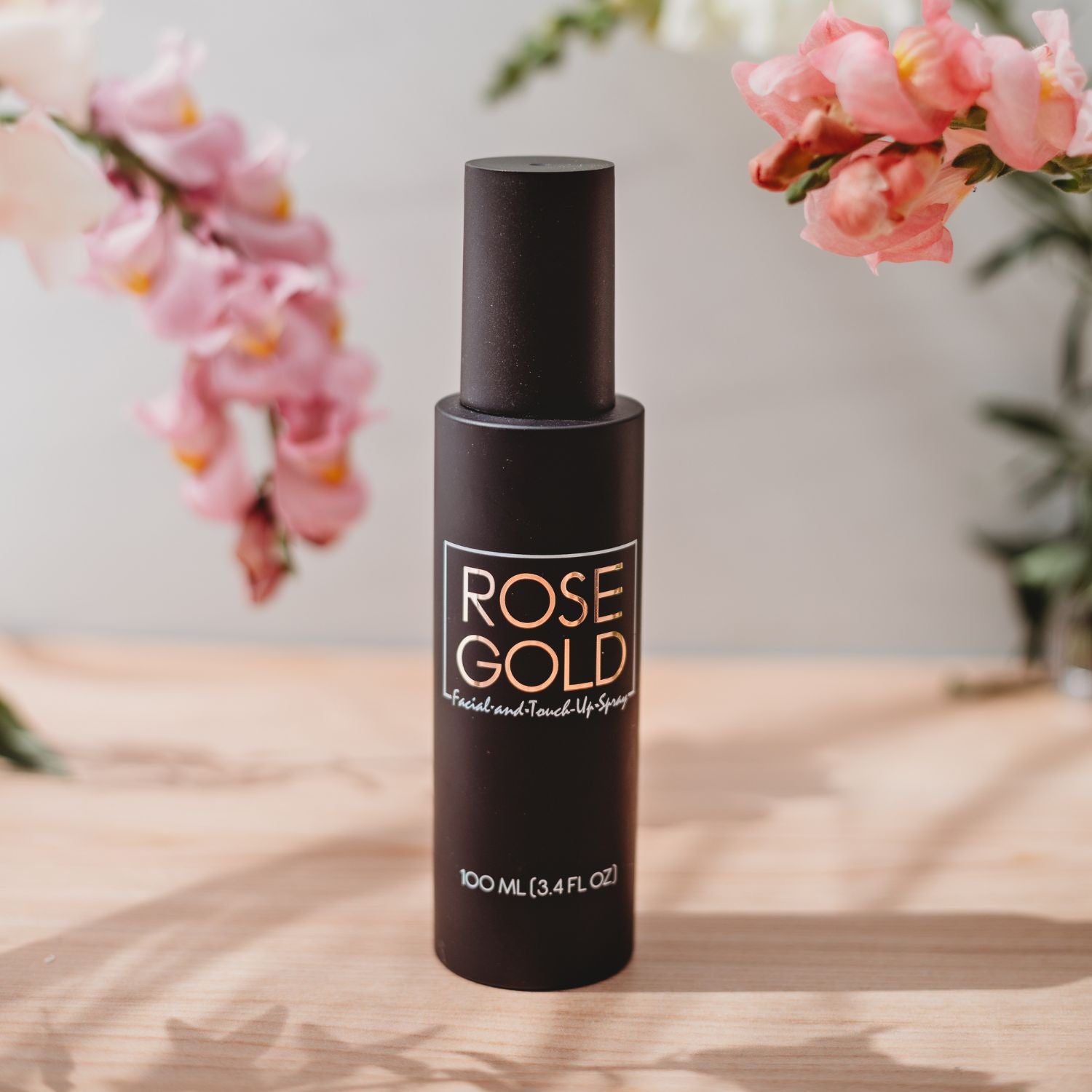 Clear facial tanning mist spray by Rose Gold Sunless, a lightweight water-based tanning water for a natural glow.