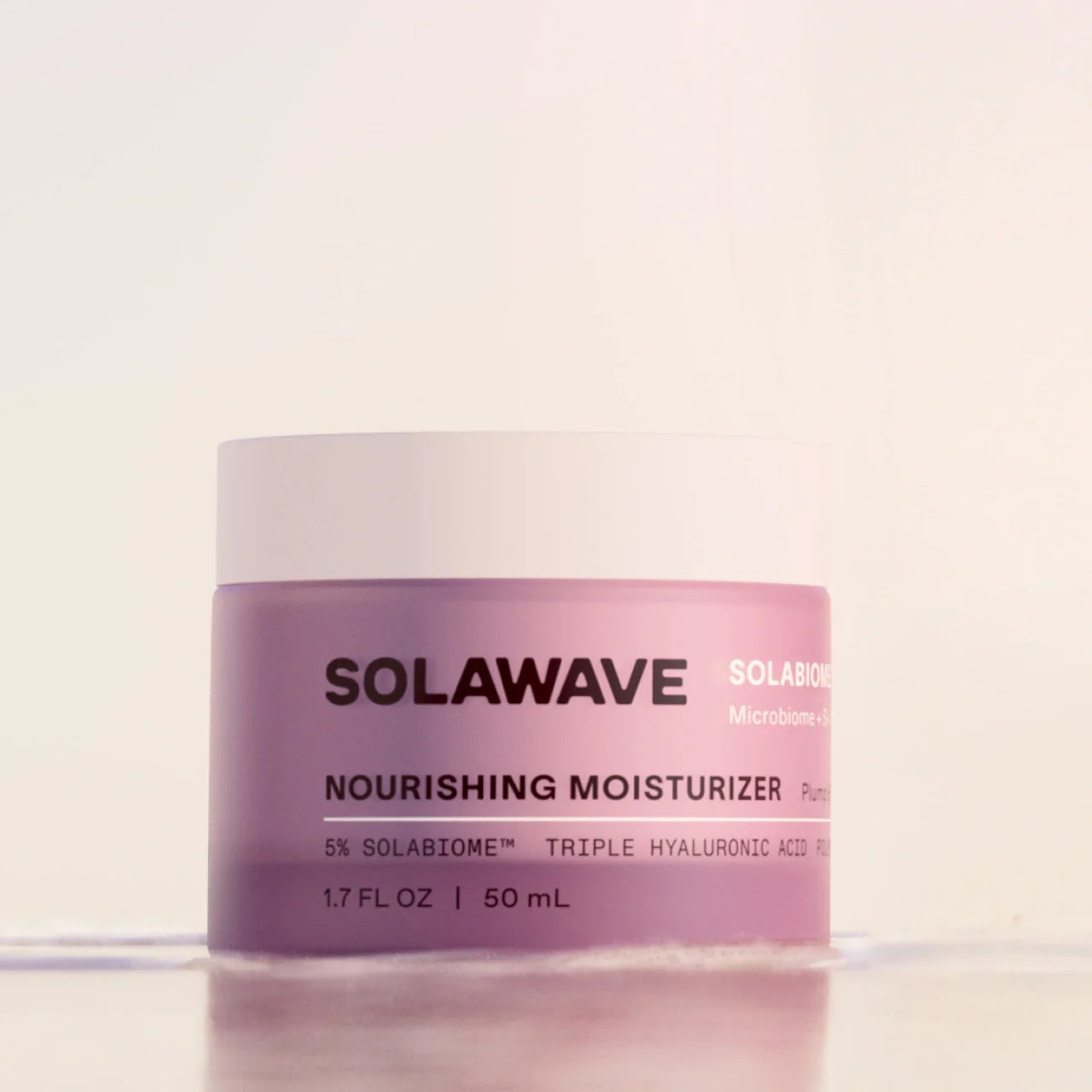 Solawave Pre- & Probiotic Nourishing Moisturizer in a sleek jar, showcasing its creamy, soothing texture for healthy skin.