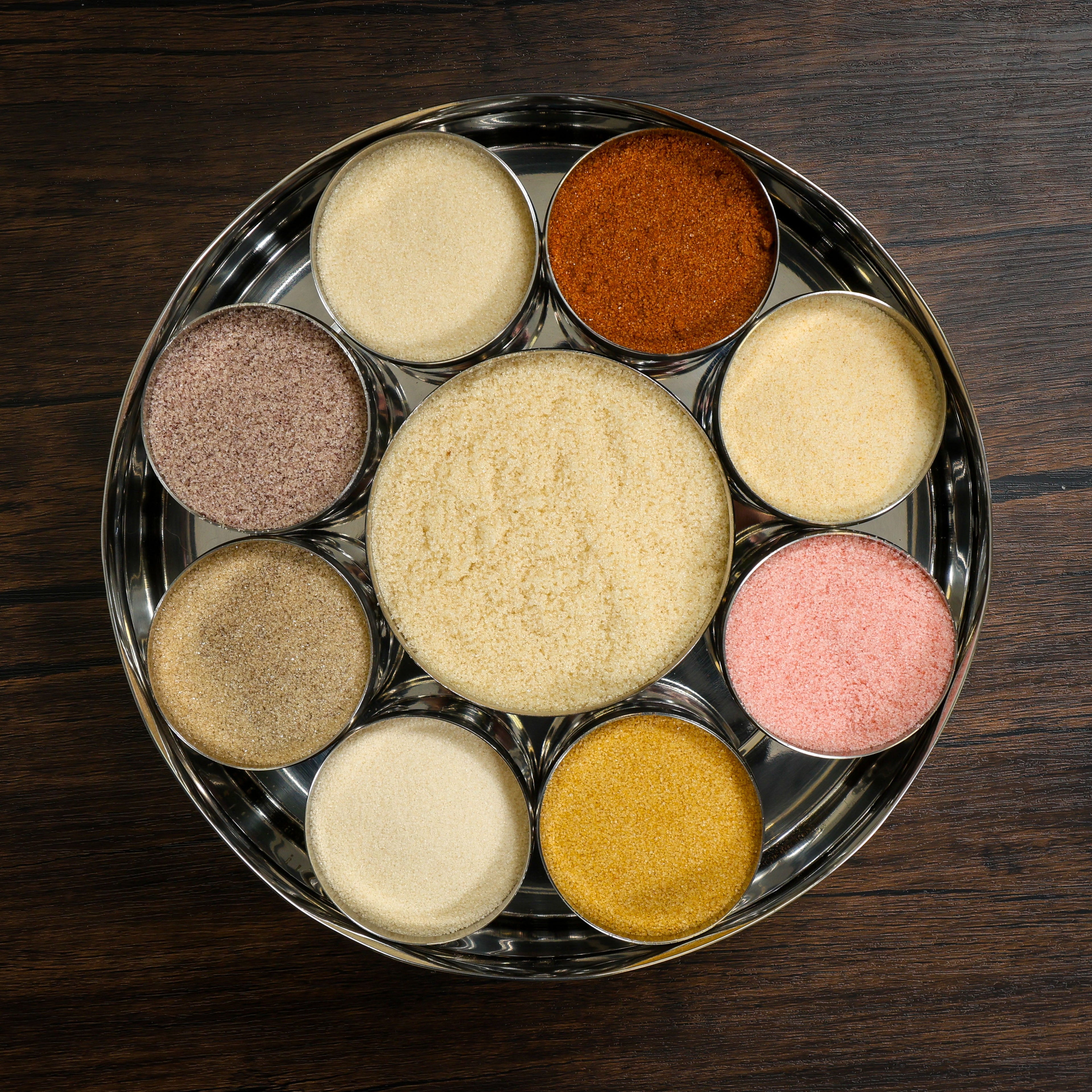 Colorful Spice Wheel with flavored sugar and spice segments, showcasing a comprehensive spice wheel for baking and cooking.