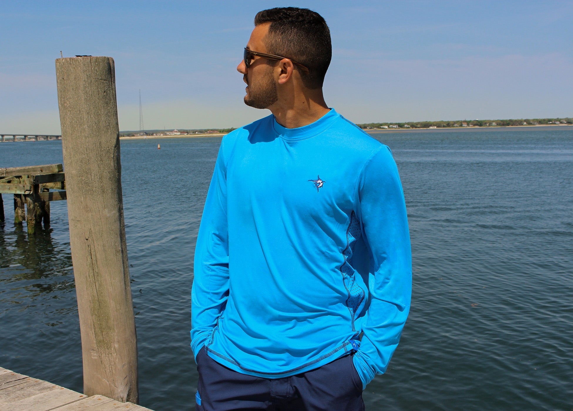 White Water Life Grander Performance long sleeve tee with sleek fit and logo, shown in a close-up front view.