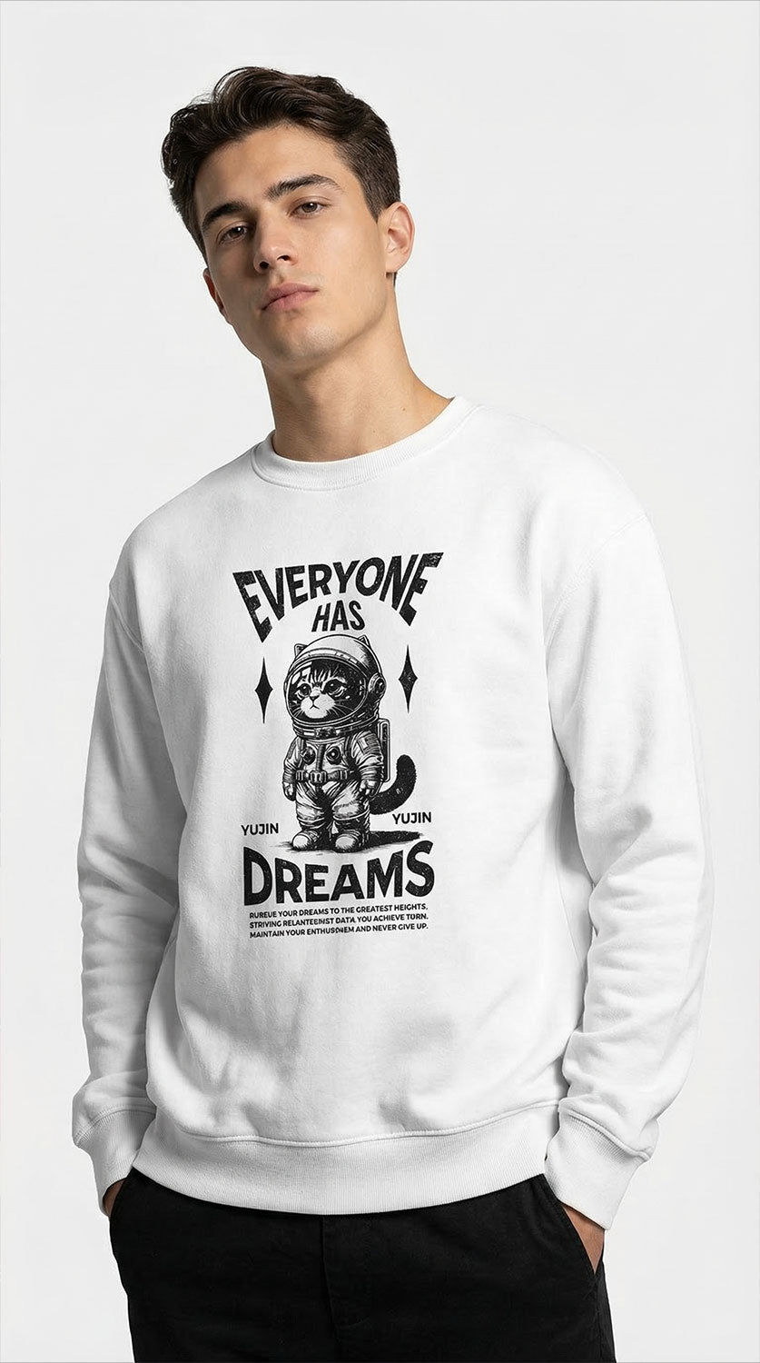 Yellow Dream Big Cat sweatshirt by Yūjin Clothing featuring a cozy design with a cat graphic and motivational text on the front.