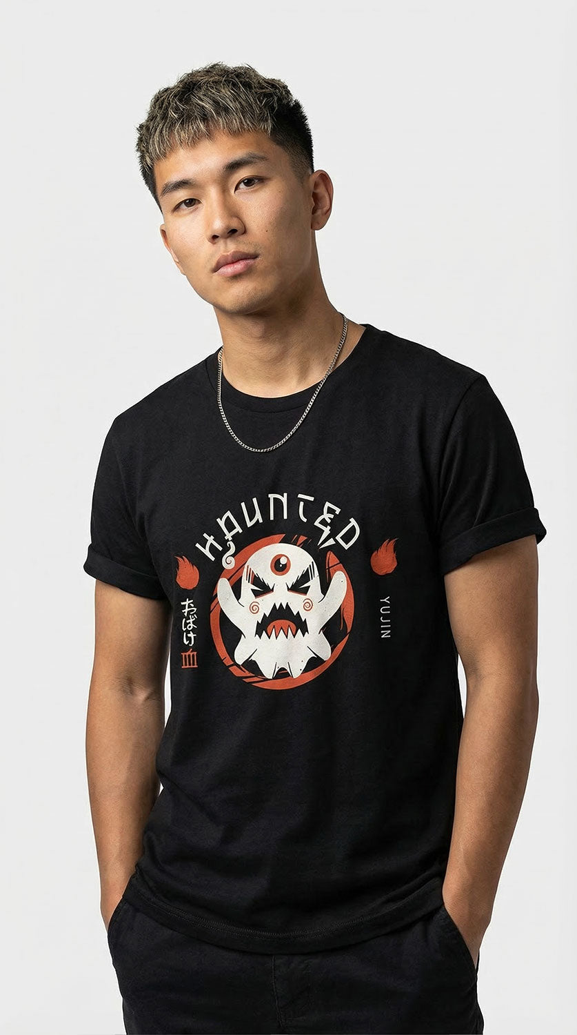 Black Haunted T-Shirt by Yūjin Clothing featuring spooky ghost graphics and eerie design on soft cotton fabric