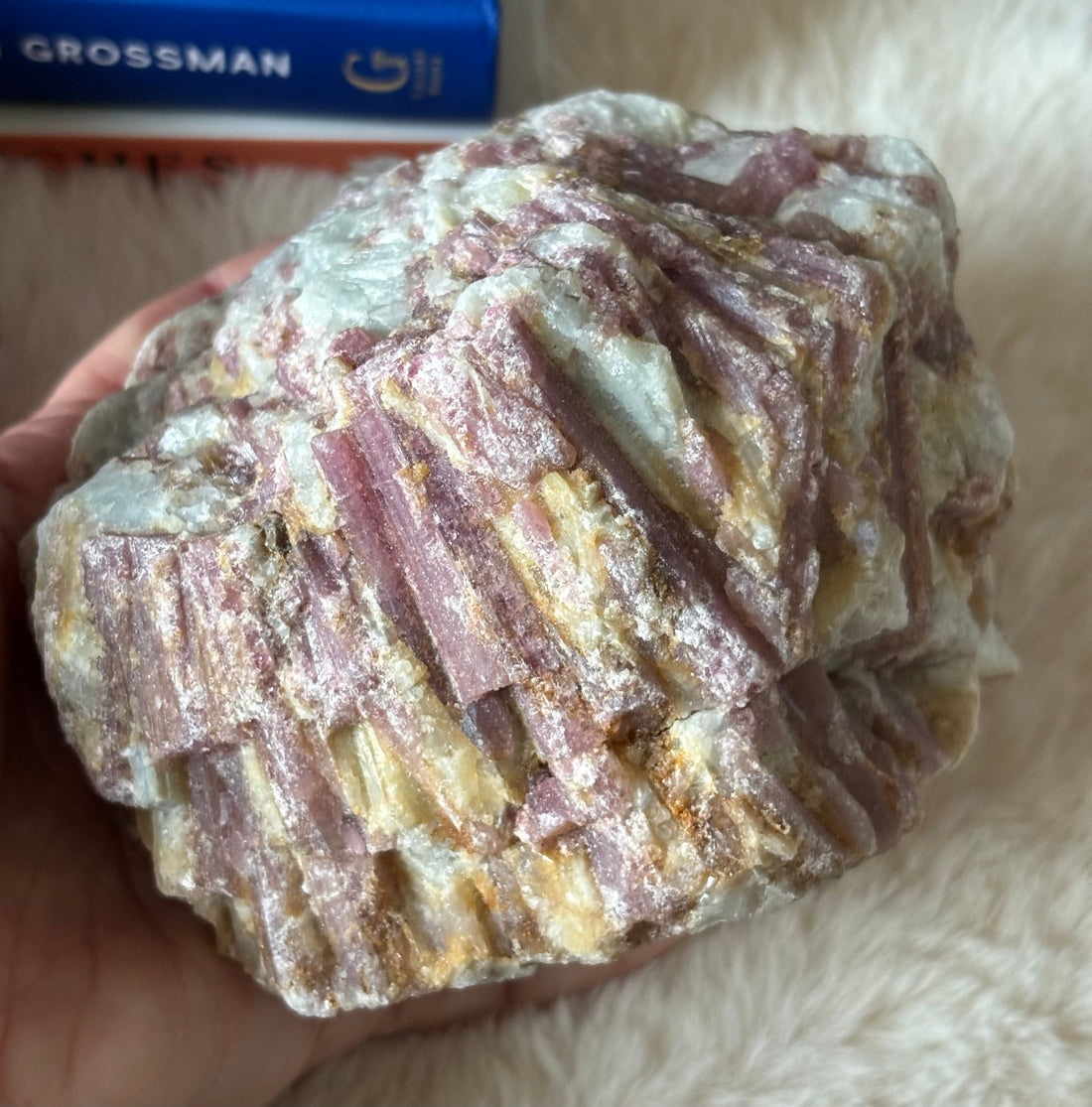Raw pink tourmaline gemstone from Evermore Everlasting showing its natural pink color and rough, unpolished texture.