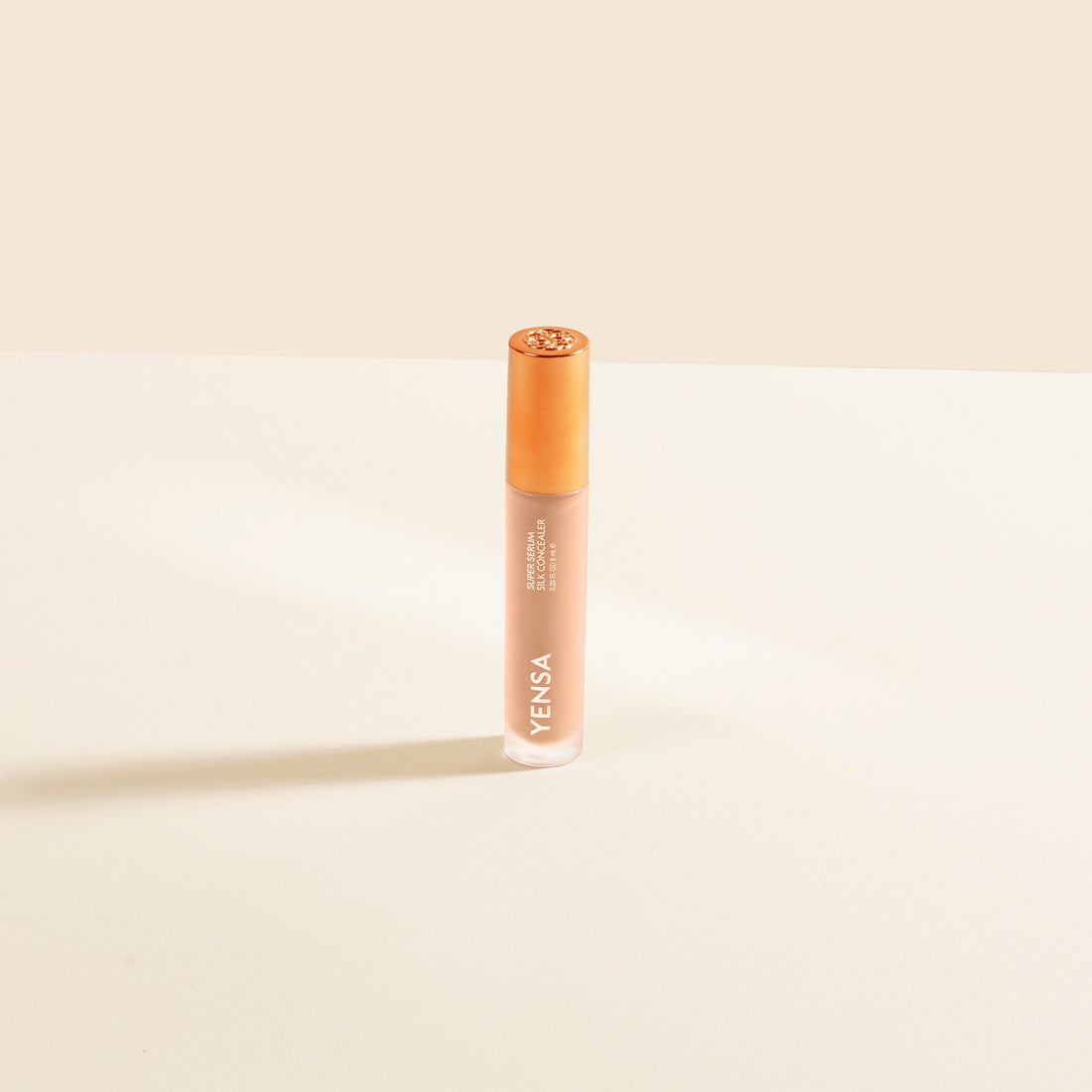 YENSA Super Serum Silk Concealer in Tan, makeup product with smooth, silky texture and natural finish, ideal for concealing imperfections.