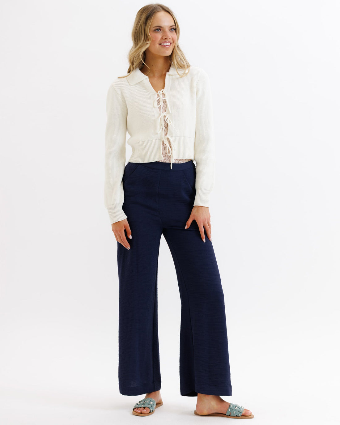 Downeast Parisian Pant in neutral fabric, featuring a tailored fit and classic style, shown on a model.