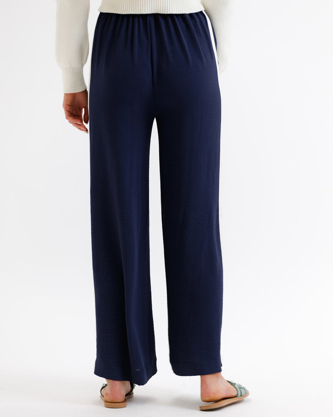 Downeast Parisian Pants in neutral fabric, showing a close-up of the waistband and relaxed fit style.