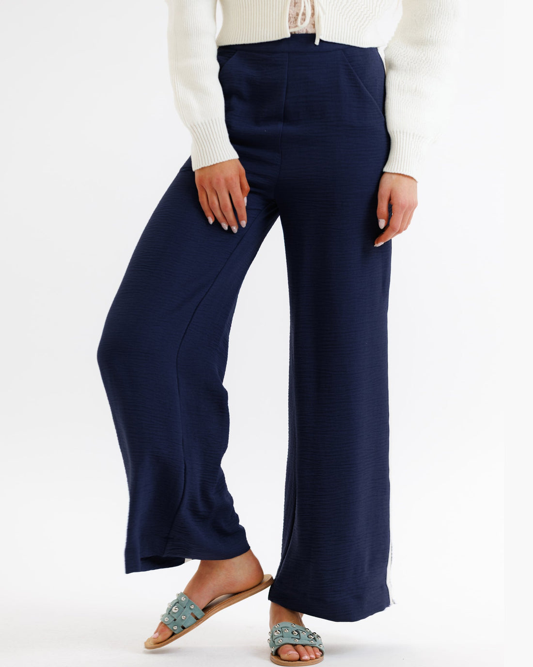 Downeast Parisian pant with tailored fit and classic style, shown in neutral fabric with front pockets and belt loops.
