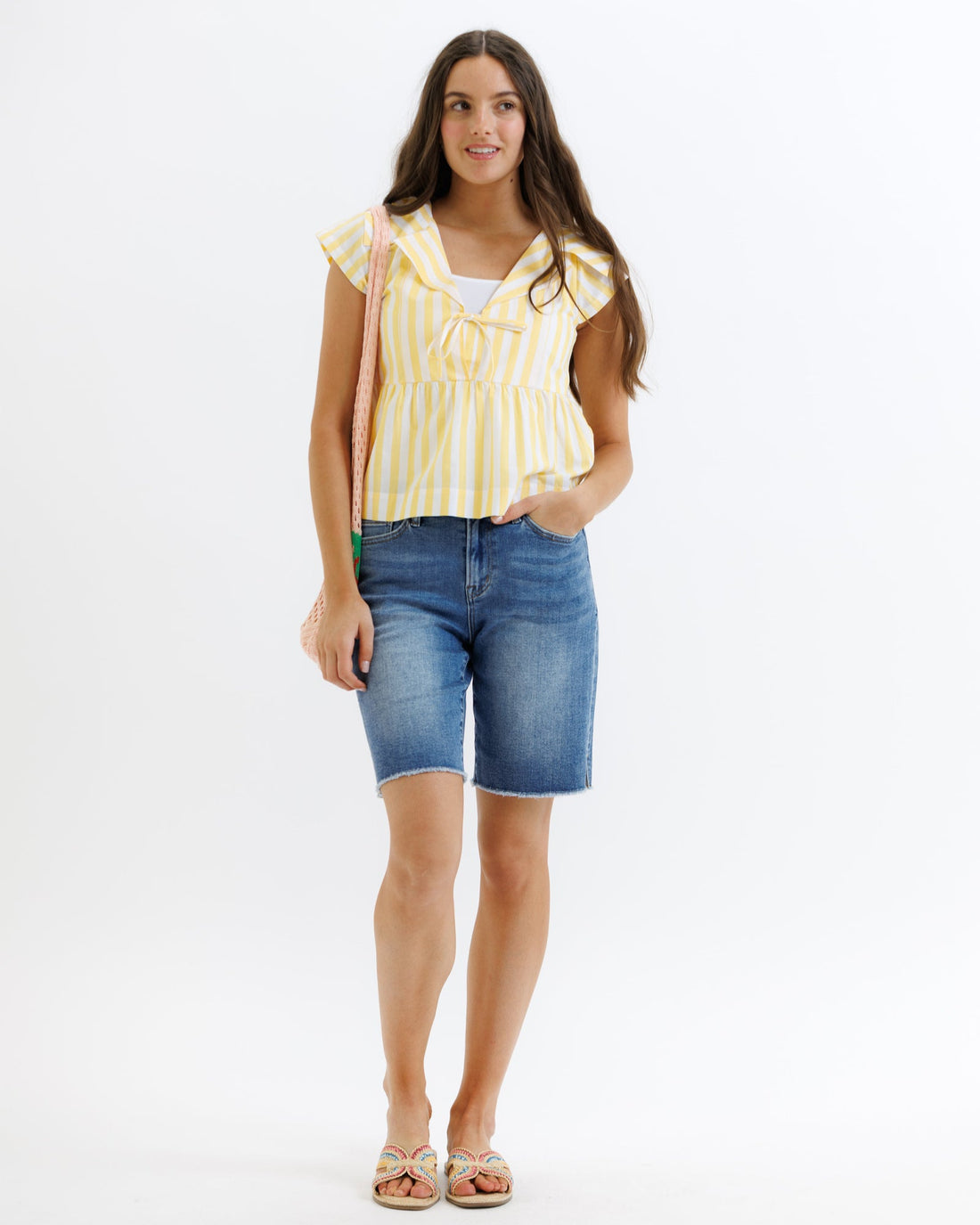 Downeast Sunshine Stripe Top featuring bright yellow and white horizontal stripes, casual short-sleeve style perfect for warm weather.