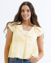 Downeast Sunshine Stripe Top featuring vibrant yellow and white striped design, lightweight fabric, and casual fit.