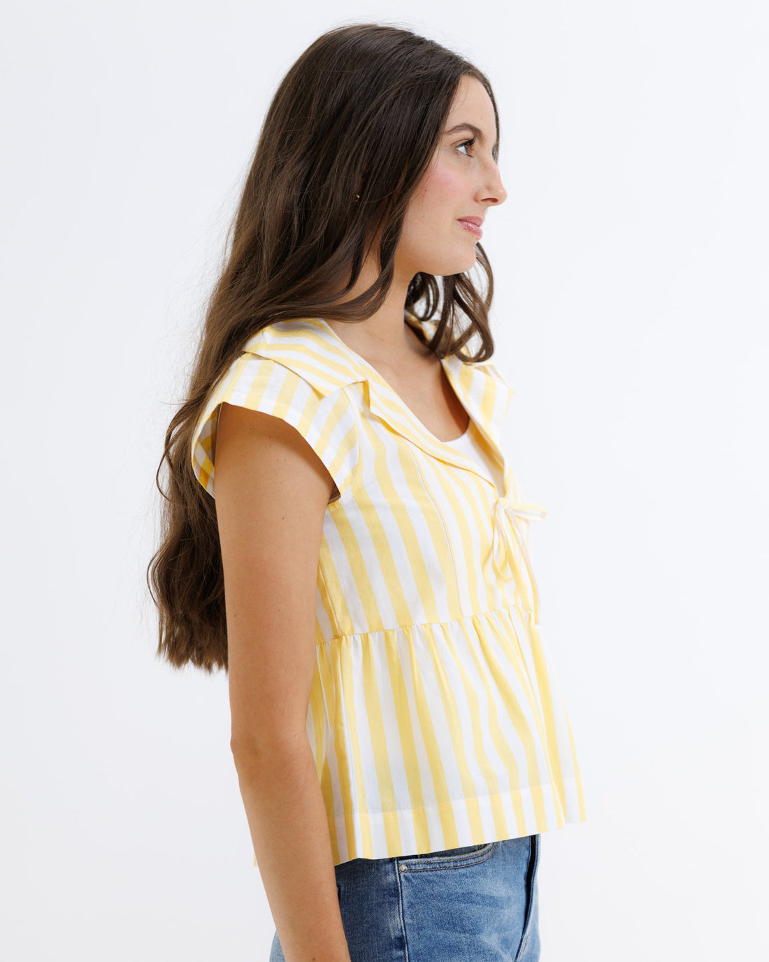 Downeast Sunshine Stripe Top featuring bright, colorful horizontal stripes and a comfortable, casual fit.