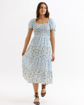 Downeast Fresh Bouquet Dress featuring a flowy, floral design with soft fabric, perfect for casual or semi-formal occasions.