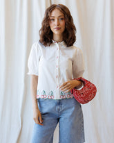 Cherry cute button-down top by Downeast featuring a playful cherry print, long sleeves, and a classic collar for casual style.