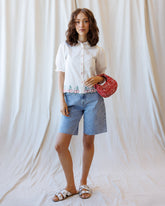 Cherry Cute Button Down top by Downeast, featuring a vibrant cherry print, long sleeves, and a classic collar.