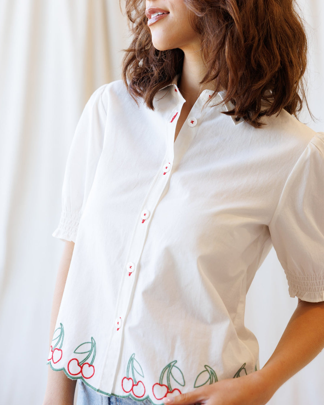Cherry Cute Button Down top by Downeast, featuring a cherry print design, with long sleeves and a classic collar.