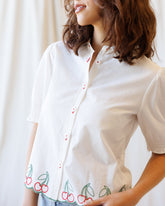 Cherry Cute Button Down top by Downeast, featuring a cherry print design, with long sleeves and a classic collar.