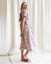 Downeast pleated shirtdress with long sleeves, button front, and tie waist, styled for a casual, elegant look.