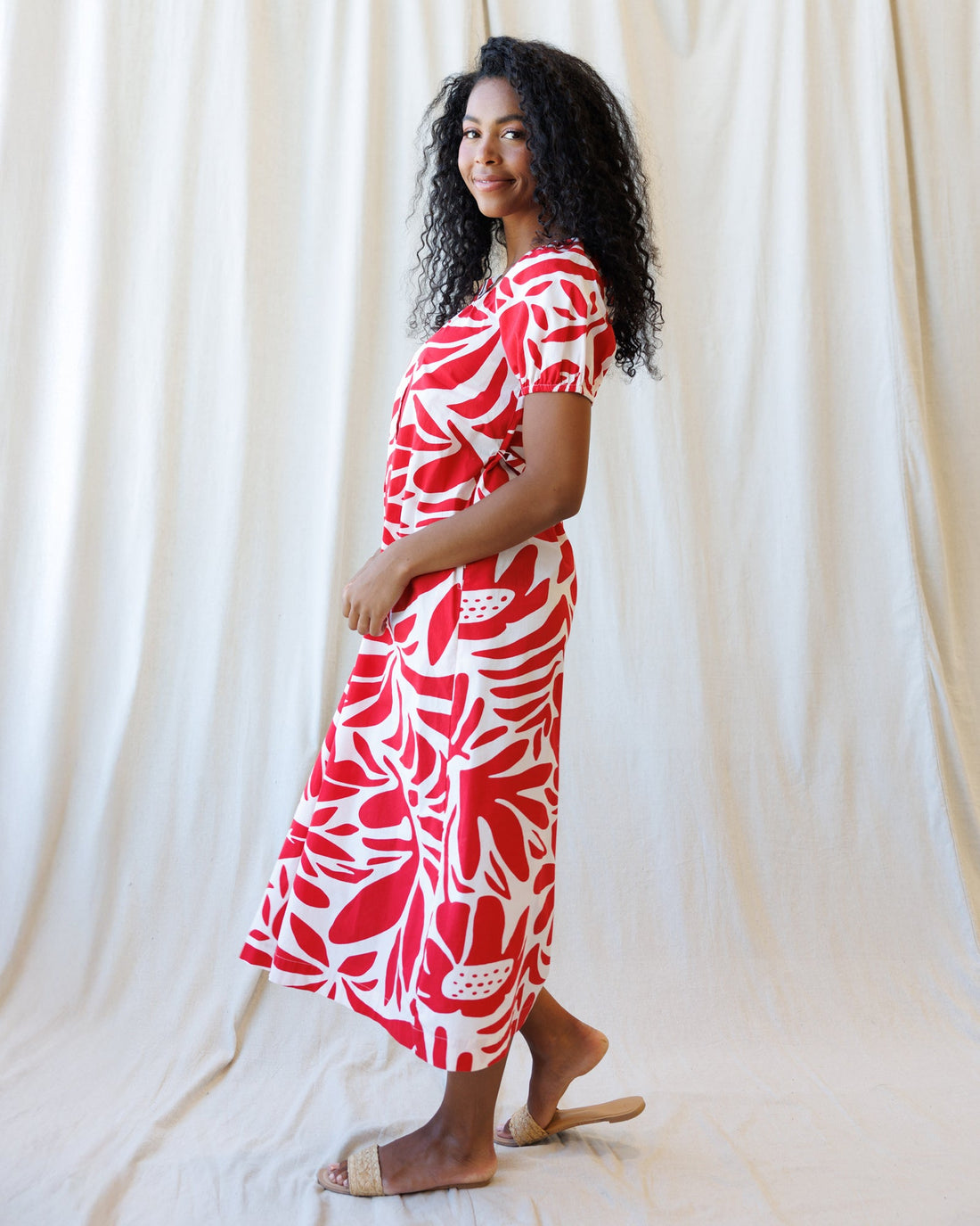 Downeast Vitamin Sea dress in lightweight fabric with a floral pattern, featuring a V-neck and short sleeves.