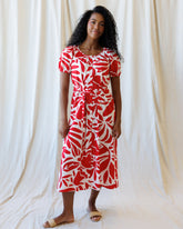Downeast Vitamin Sea Dress displayed on a hanger, featuring a breezy, lightweight fabric with a colorful seaside print.