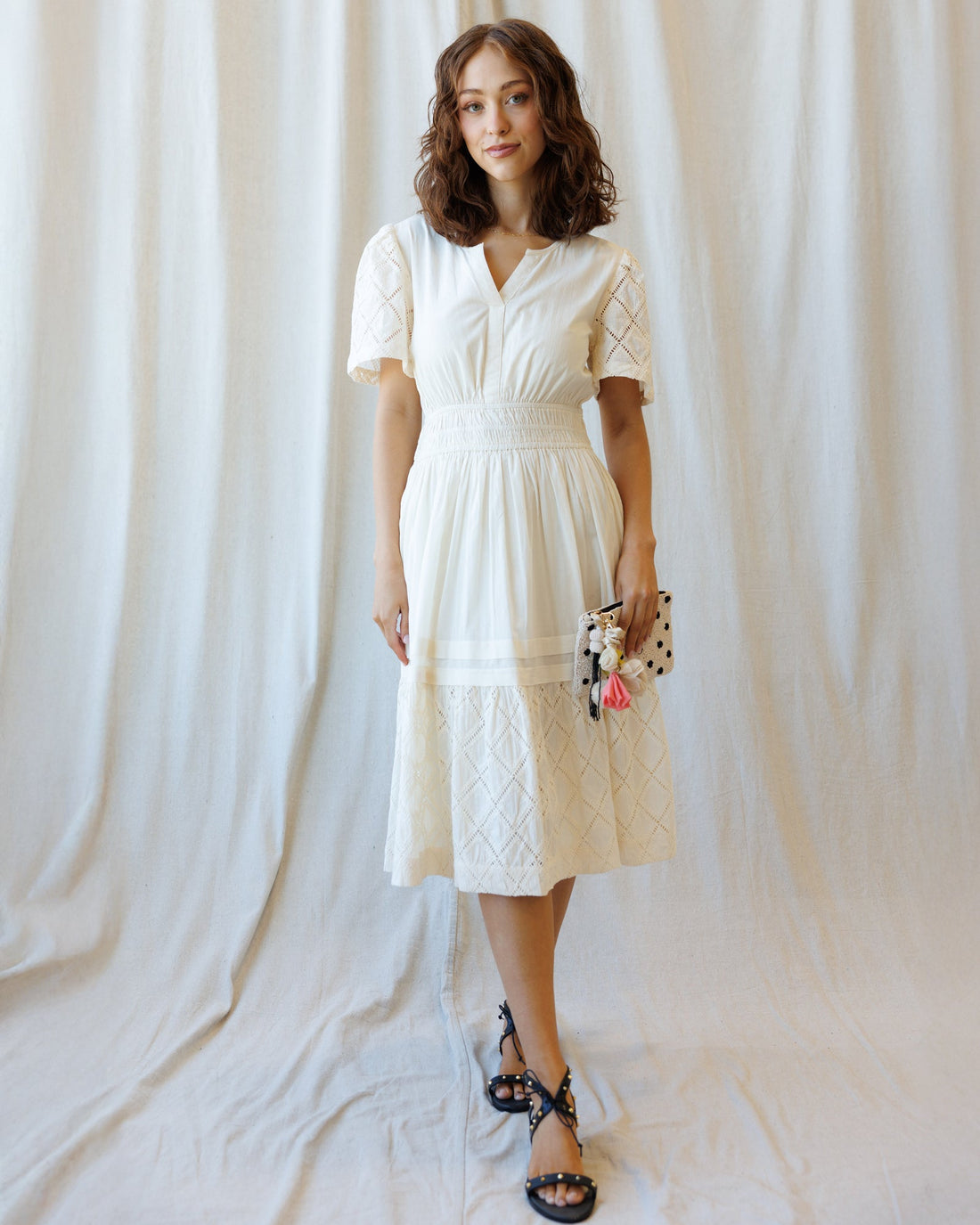 Downeast Icon Demi Lace Dress featuring intricate lace details and a flattering silhouette, perfect for elegant occasions.